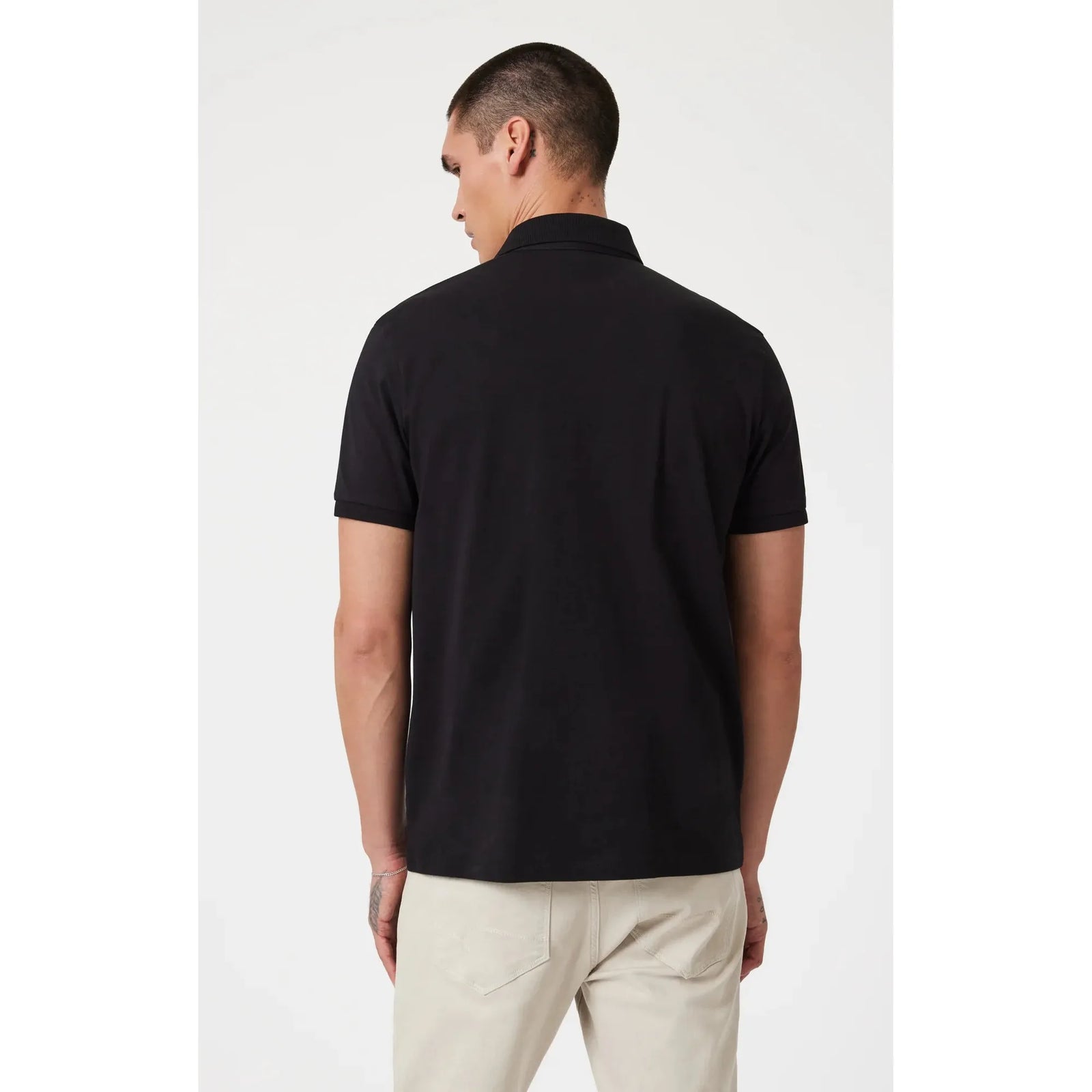 Mavi Athletic Polo Shirt in black, featuring a slim fit and classic design, perfect for any casual occasion.