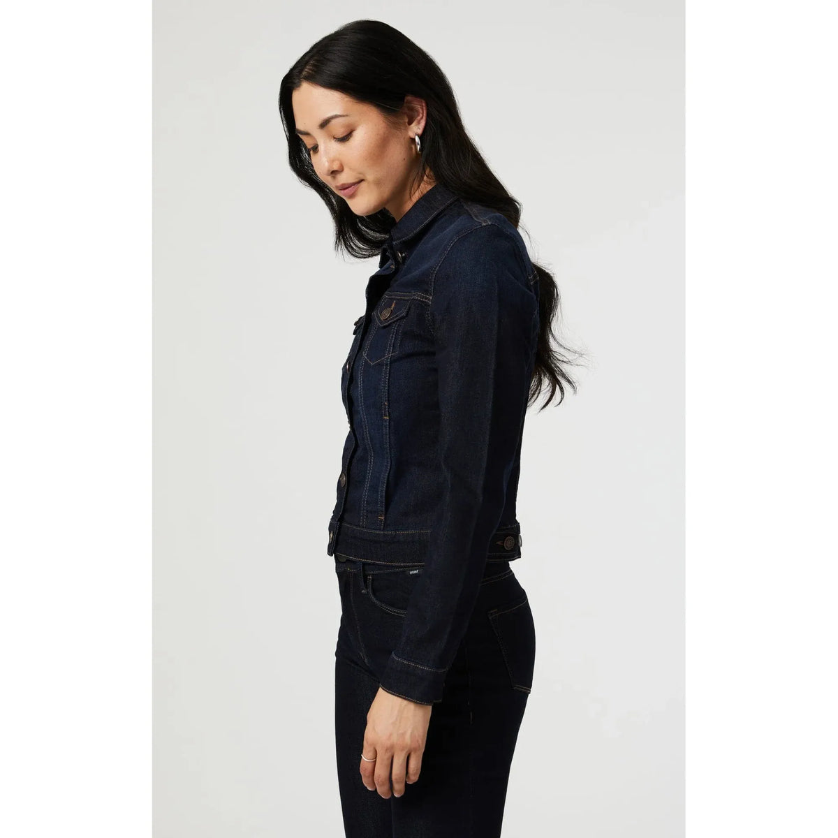 Model in Mavi Samantha Dark Nolita Jean Jacket, flattering silhouette with heavy-weight denim for year-round layering.