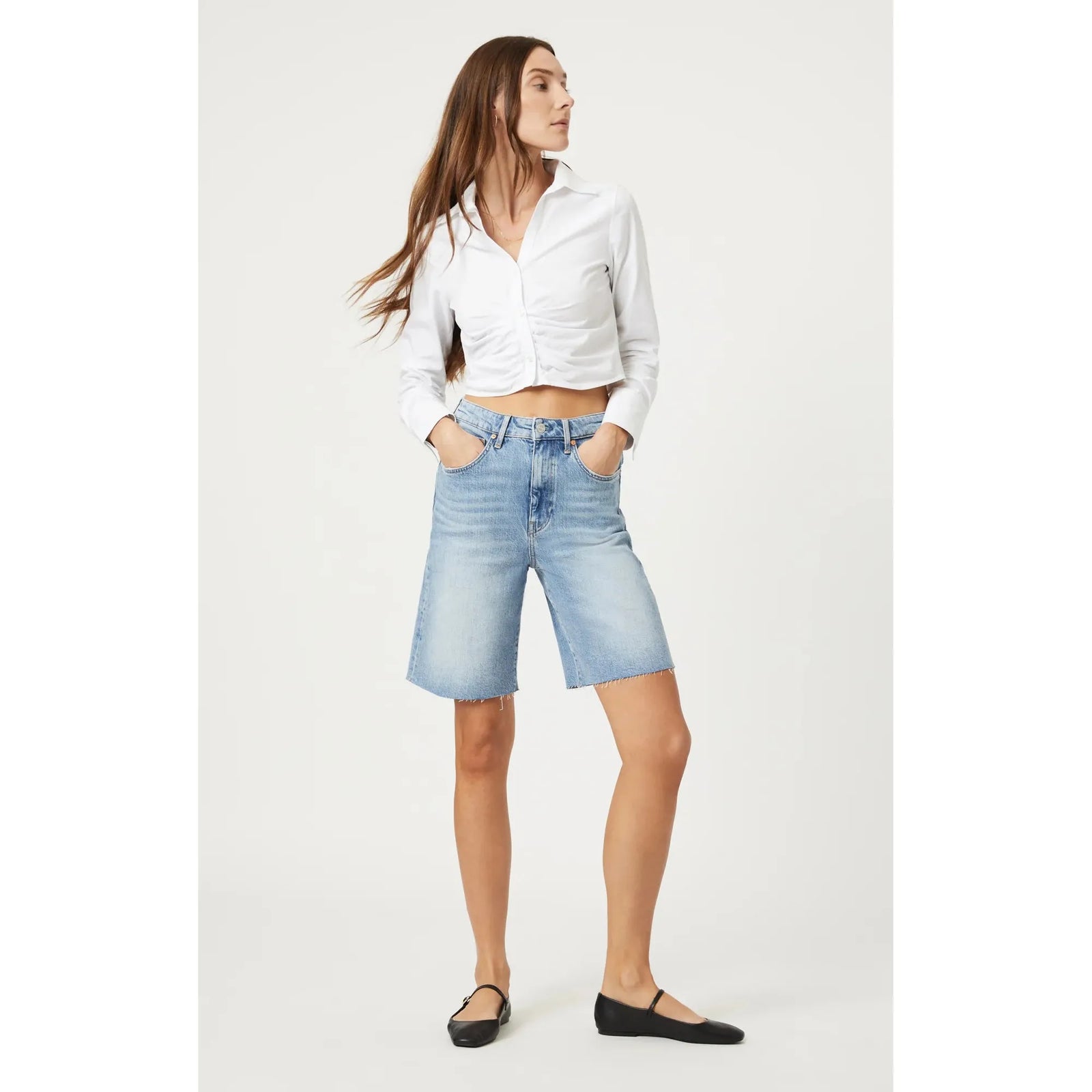 Mavi Selina Bermuda Shorts offer effortless style and luxury comfort in classic blue for a chic summer look.