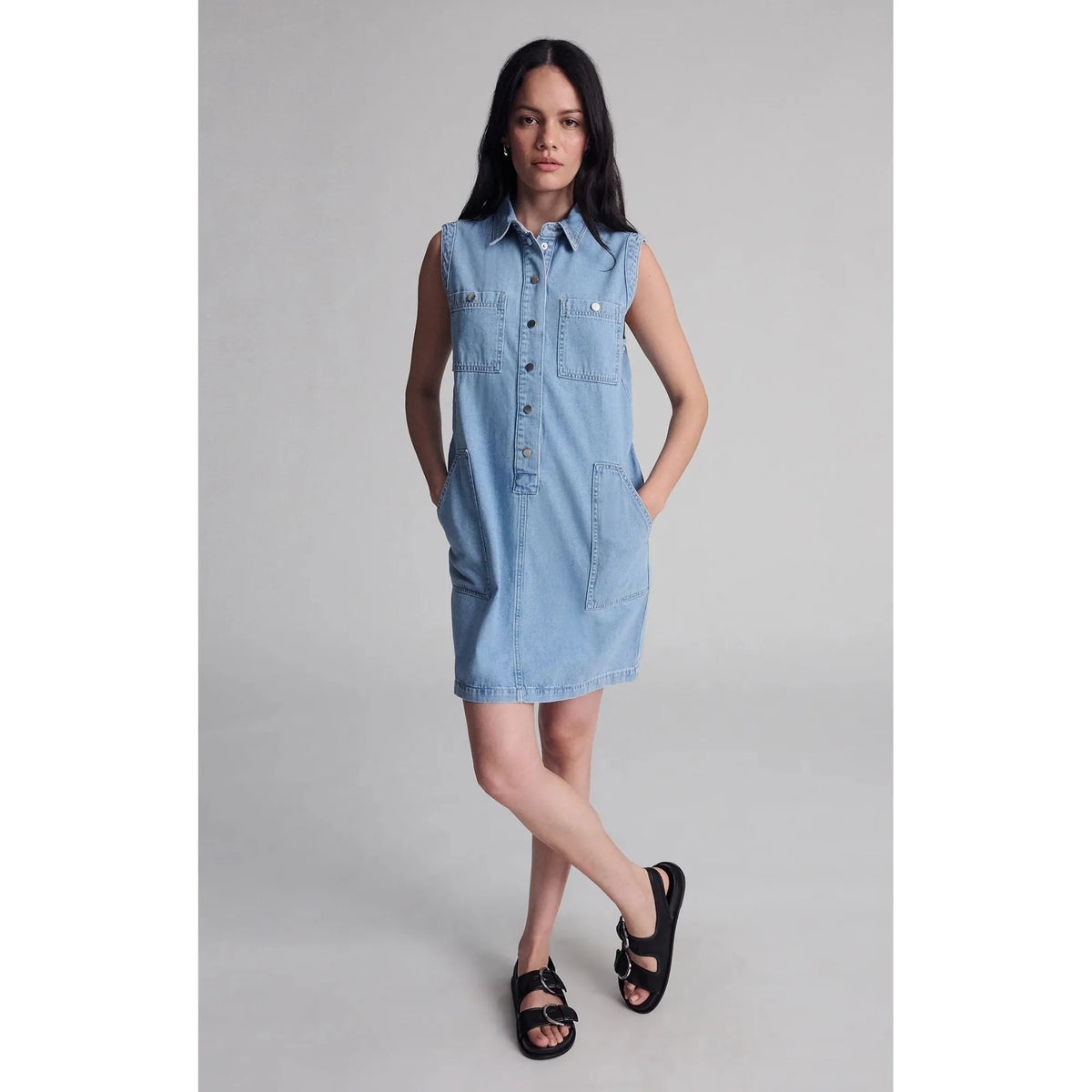 Mavi Simla Pocket Dress by Mavi features sleeveless denim with snap buttons and utility pockets for casual chic style.