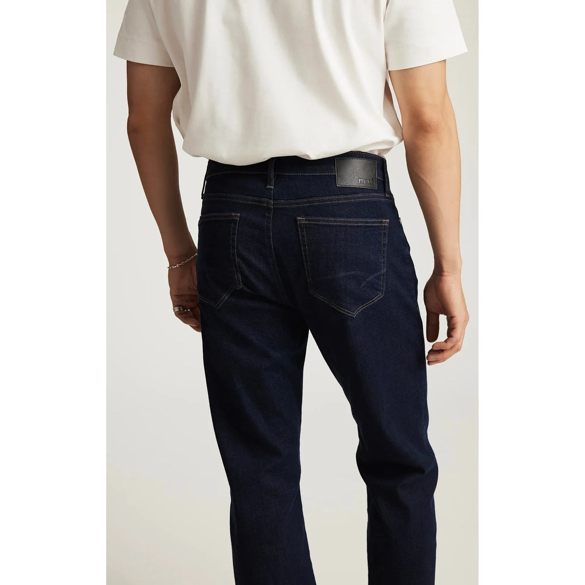 Mavi Zach Rinse Feather Blue Denim — midnight blue straight-leg jeans with bold, confident fit.