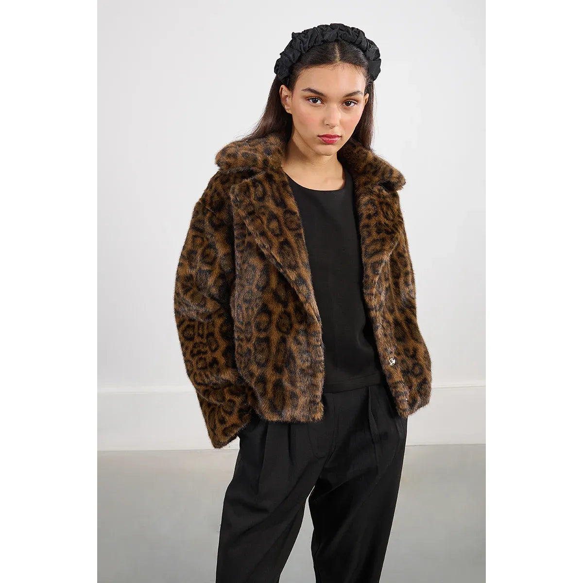 Molly Bracken animal print leopard faux fur jacket with a wide shawl collar, short roomy fit, fully lined.