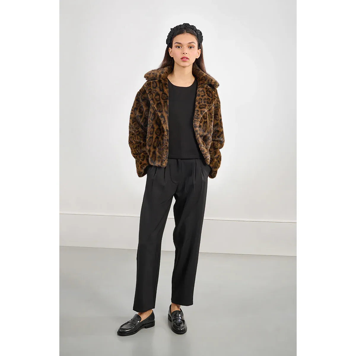 Molly Bracken animal print leopard faux fur jacket with a wide shawl collar, short roomy fit, fully lined.