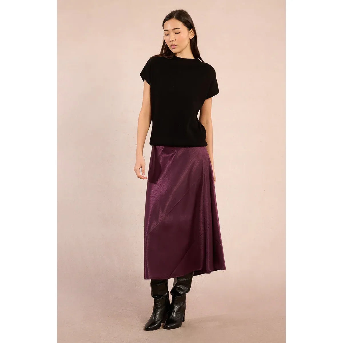 Model wearing black Molly Bracken SS Knitted Crew Neck Sweater with short sleeves, semi-stand collar and straight fit.