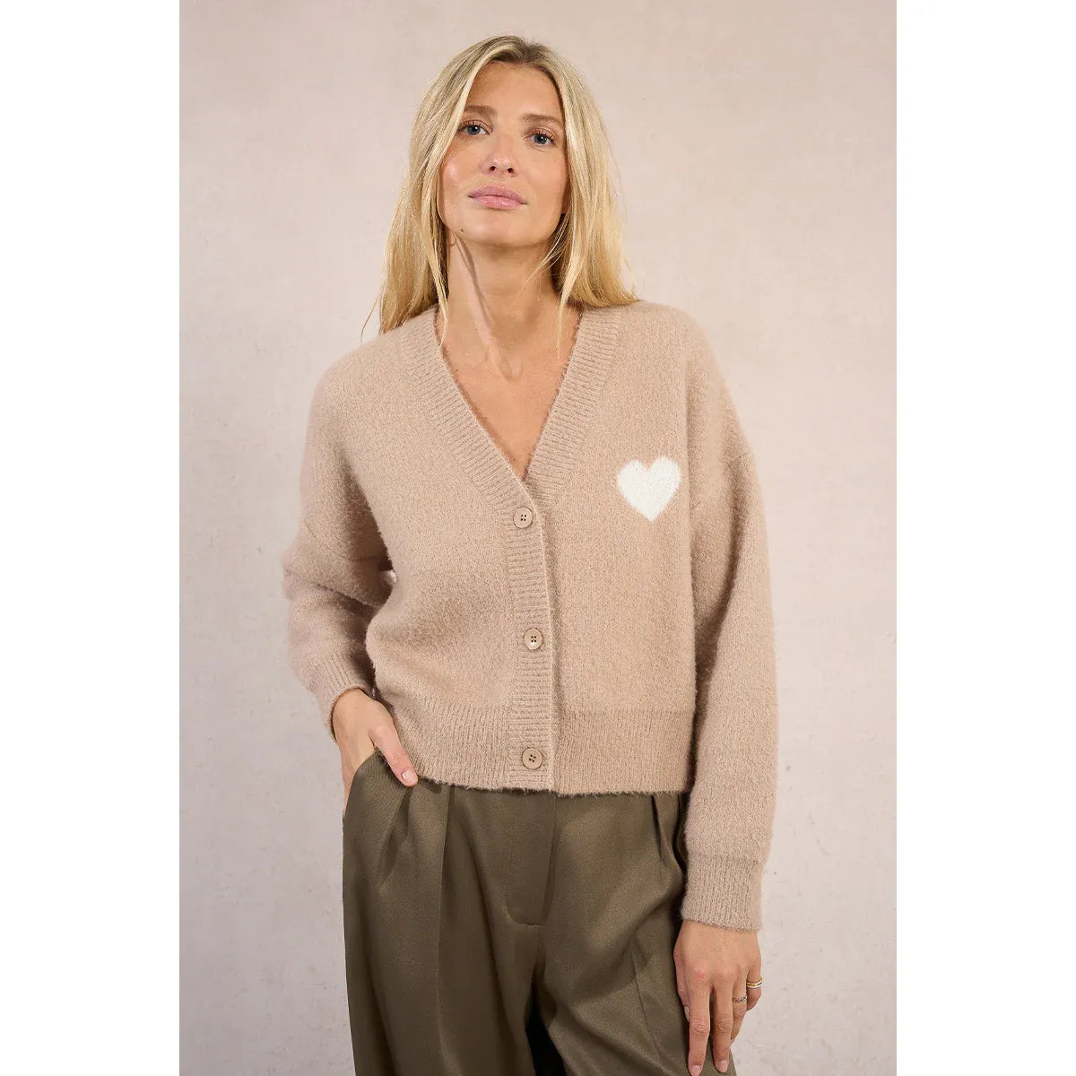Molly Bracken Short Heart Cardigan in beige with white heart motif, V-neck, buttoned front, short length.