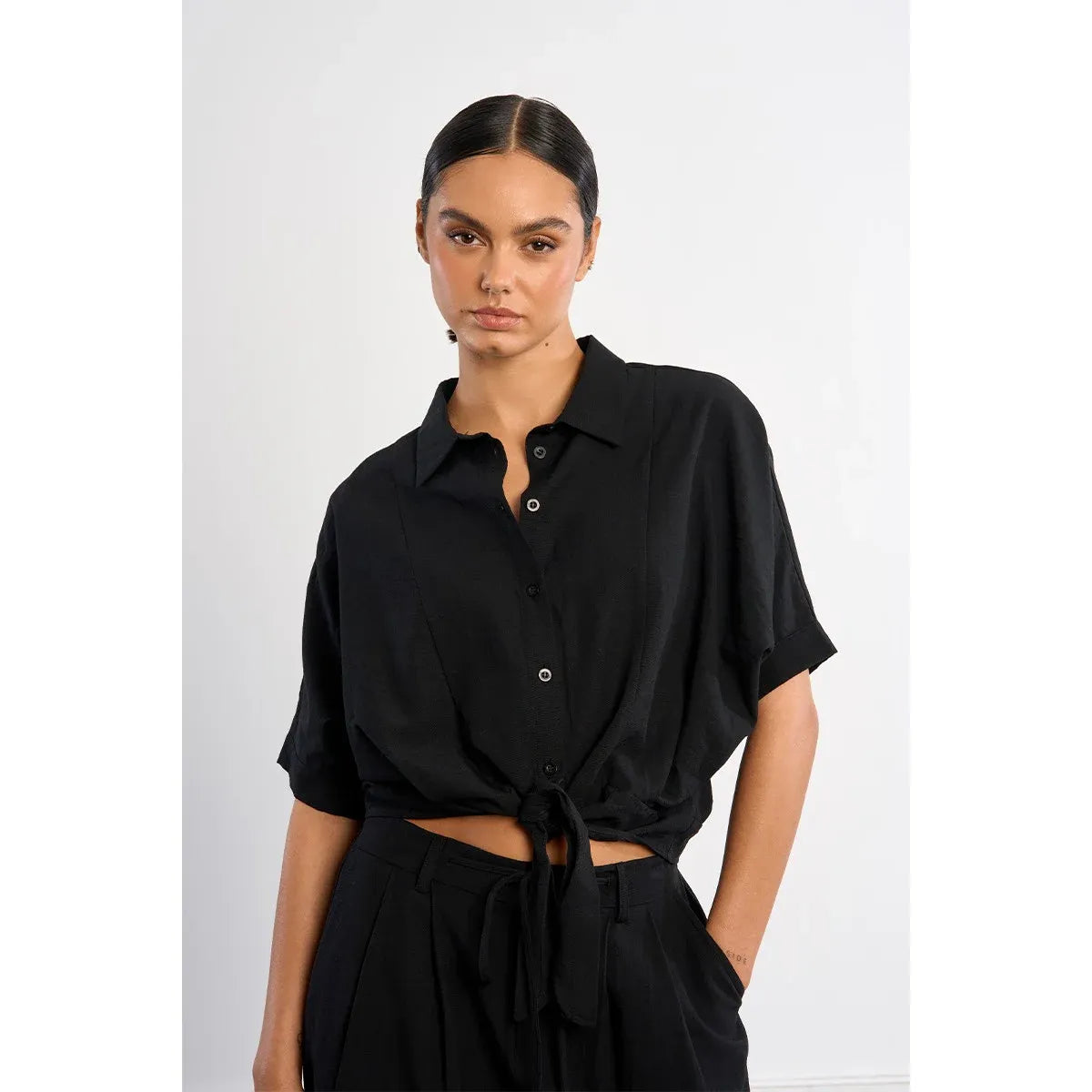 Molly Bracken Knotted Blouse in black with front knot, collar, short sleeves.