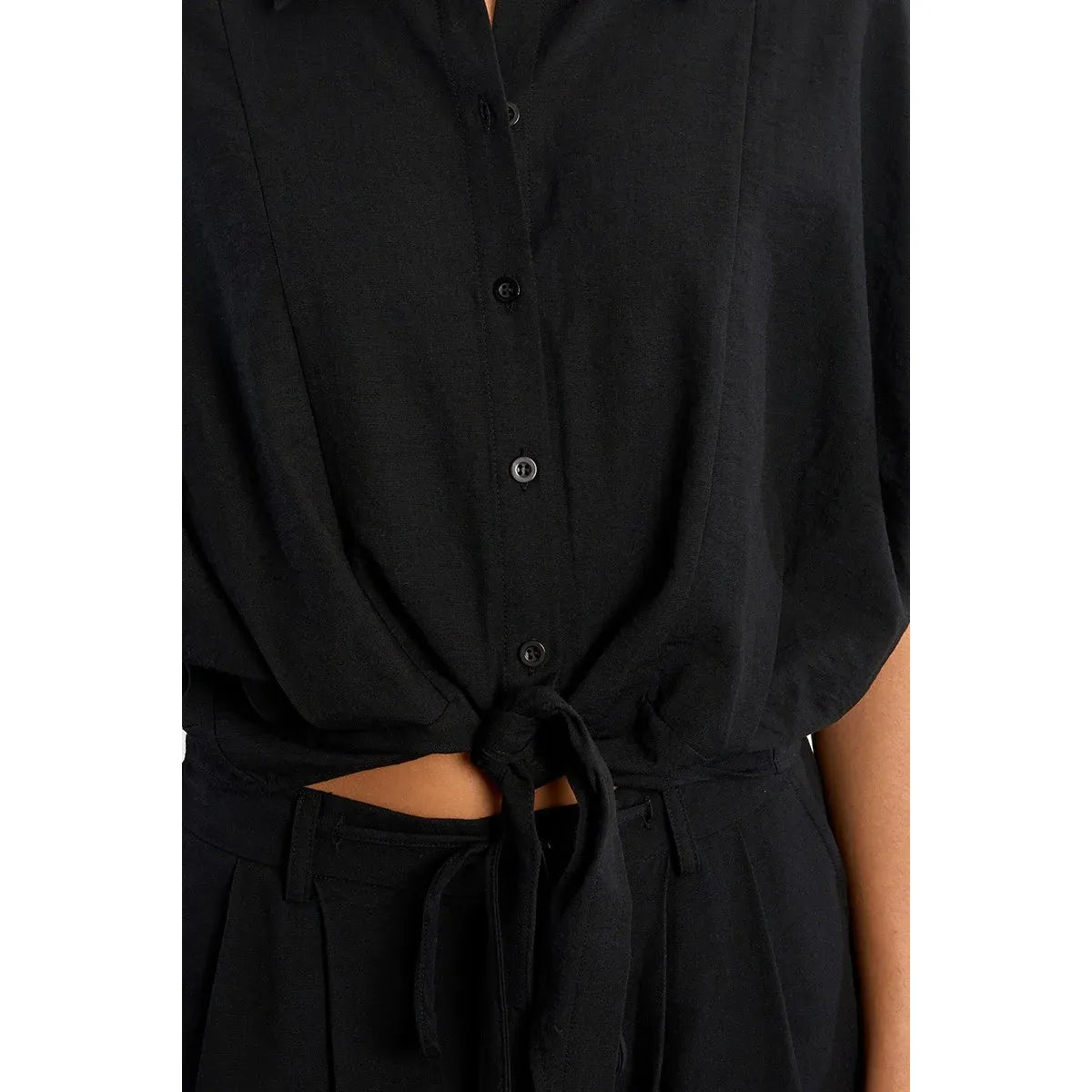 Molly Bracken Knotted Blouse with front knot, black button-down, tied at waist.