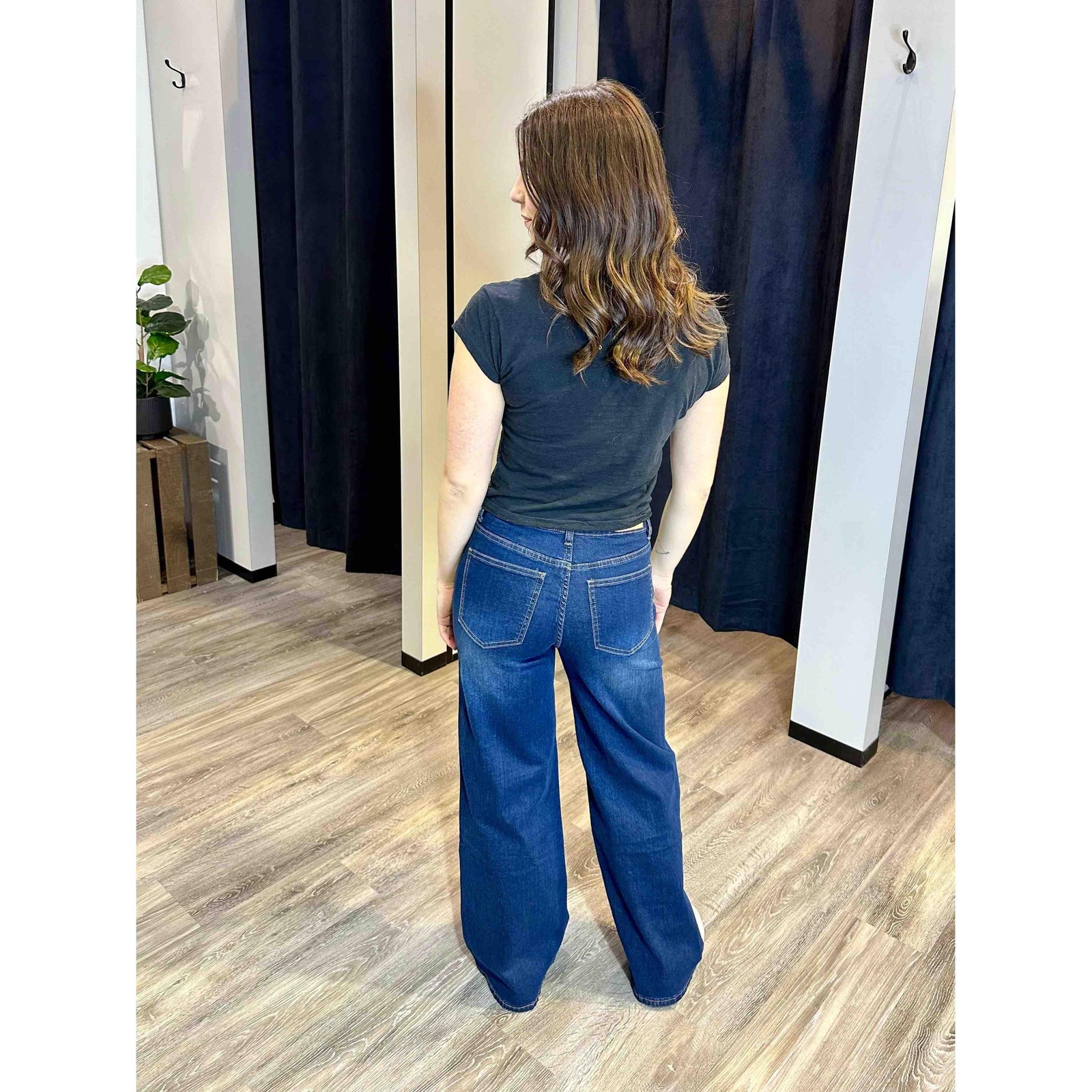Back view of a person wearing Molly Bracken Jamie Wide Leg Denim Dark Blue Pant.