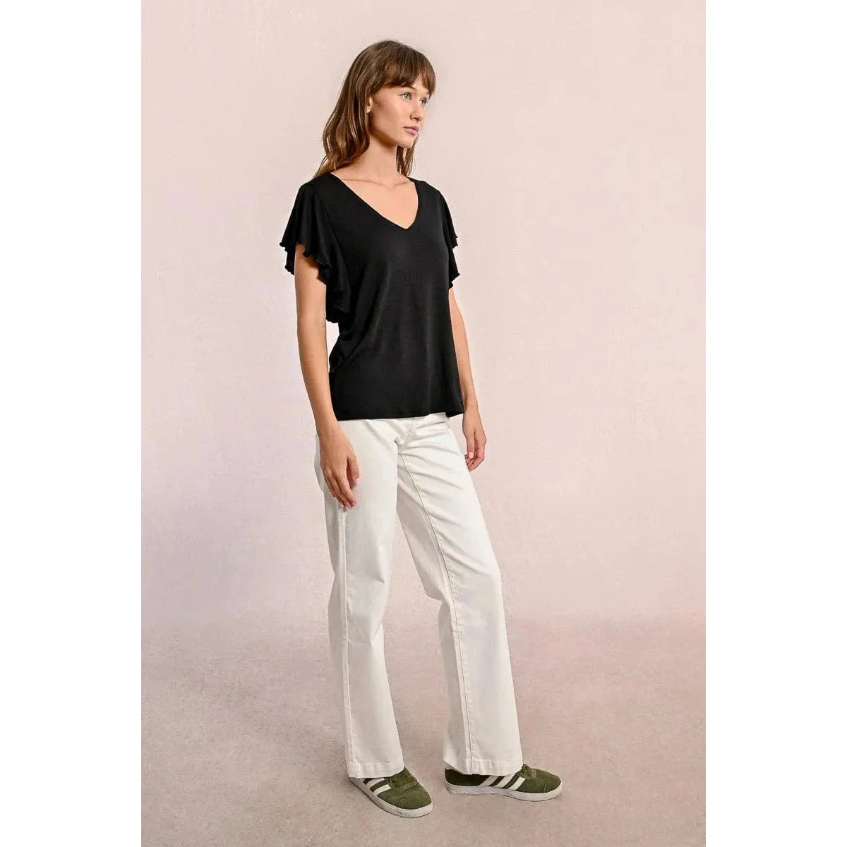 Stylish Molly Bracken Ruffled Tshirt in black, featuring a V neckline and playful ruffled sleeves for a chic look.
