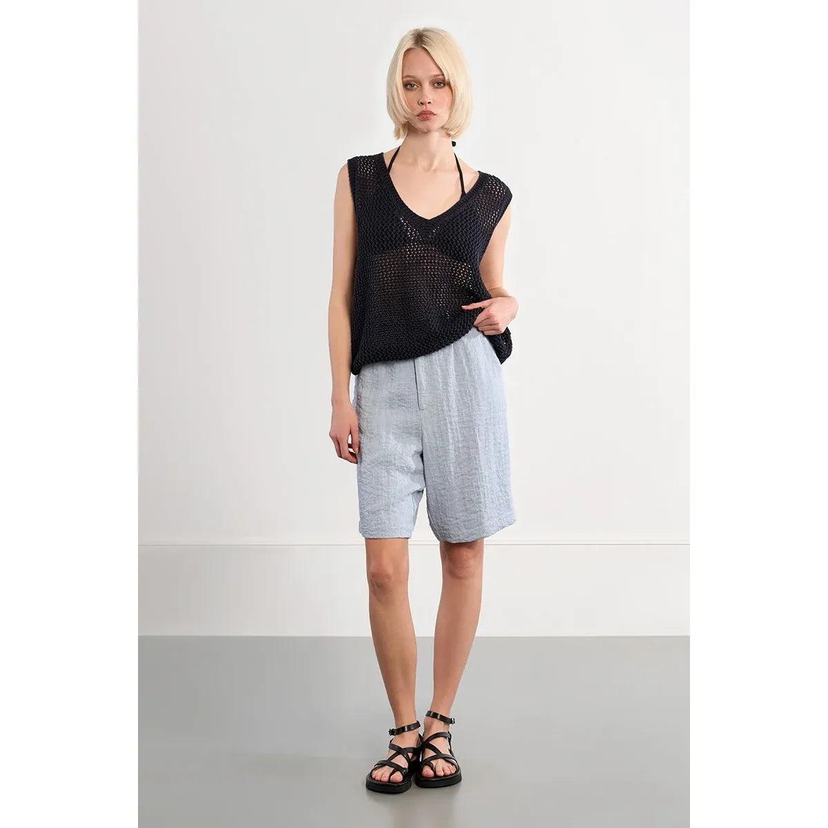 Molly Bracken sleeveless openwork knit top in black, oversized relaxed fit with a V-neck