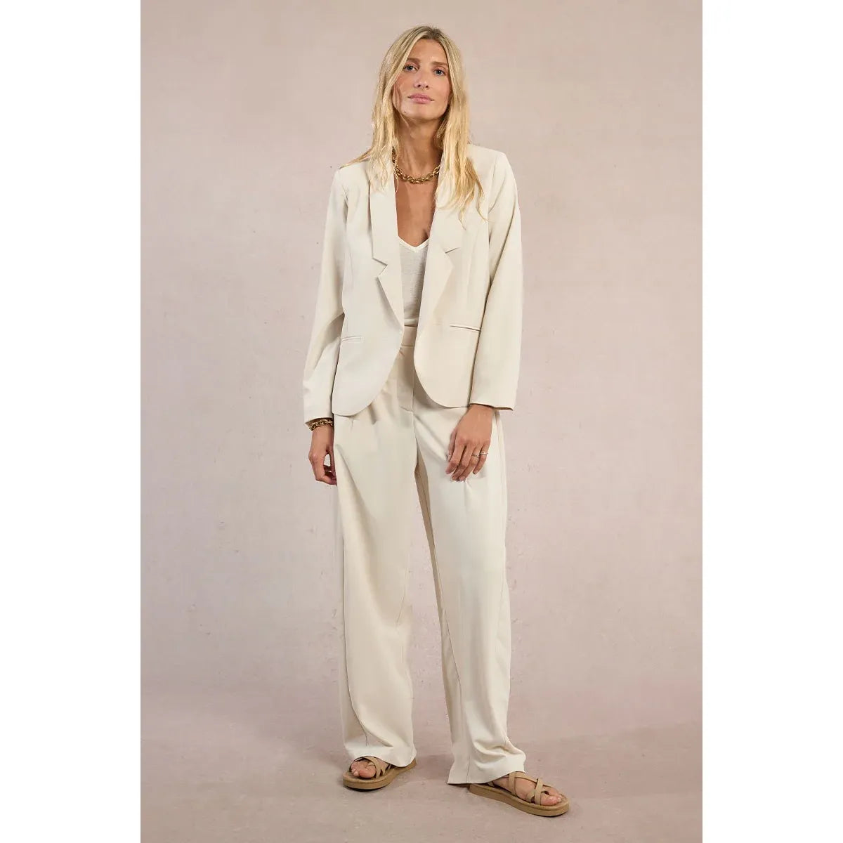 Cream Molly Bracken Straight Blazer with a tailored collar and matching trousers on a model.
