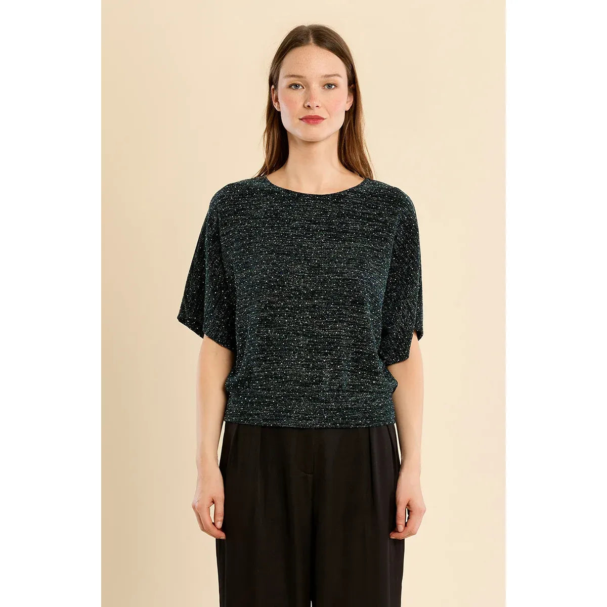 Sparkly metallic black top with wide short sleeves and gathered hem. Rhinestone shimmer texture perfect for holiday parties or nights out.