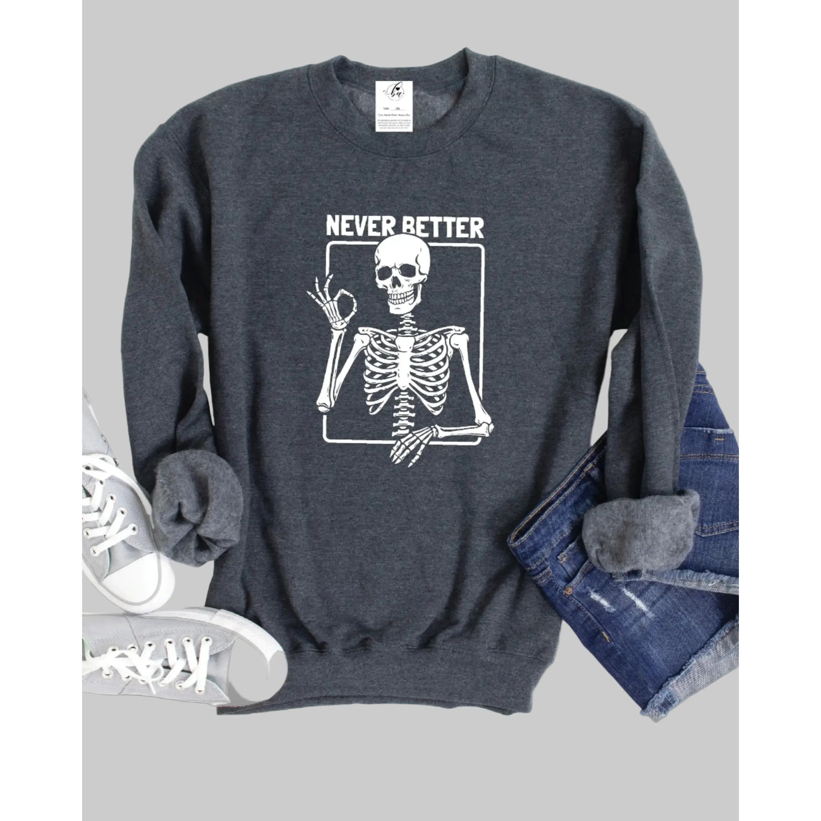 Never Better Crew Sweater by Never Better — charcoal sweatshirt with skeleton graphic.