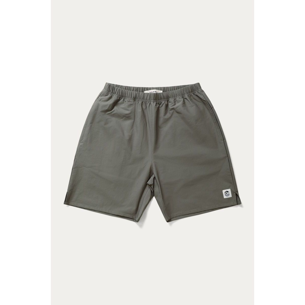 Park & Rec Nylon Shorts worn by a male model in a white tee; lightweight gray quick-dry shorts.