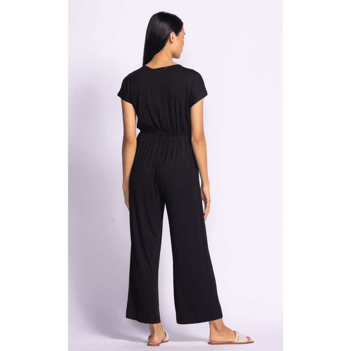 Stylish Pink Martini Eli Jumpsuit in black, a versatile wardrobe essential for casual or dressed-up looks.