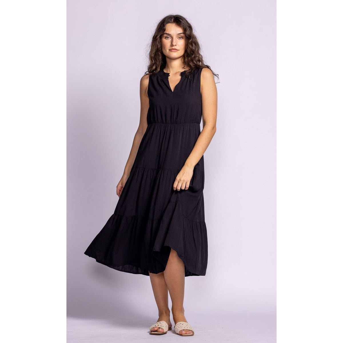 Effortlessly elegant, the Pink Martini Jennifer Dress features a tiered design and elastic waistband for comfort.