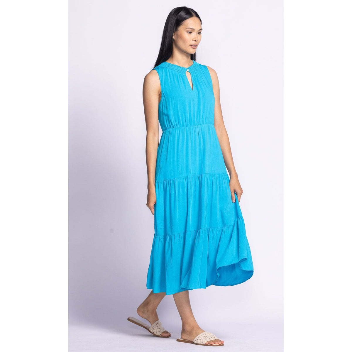 Effortlessly stylish, the Pink Martini Jennifer Dress features a tiered design and flattering elastic waistband.