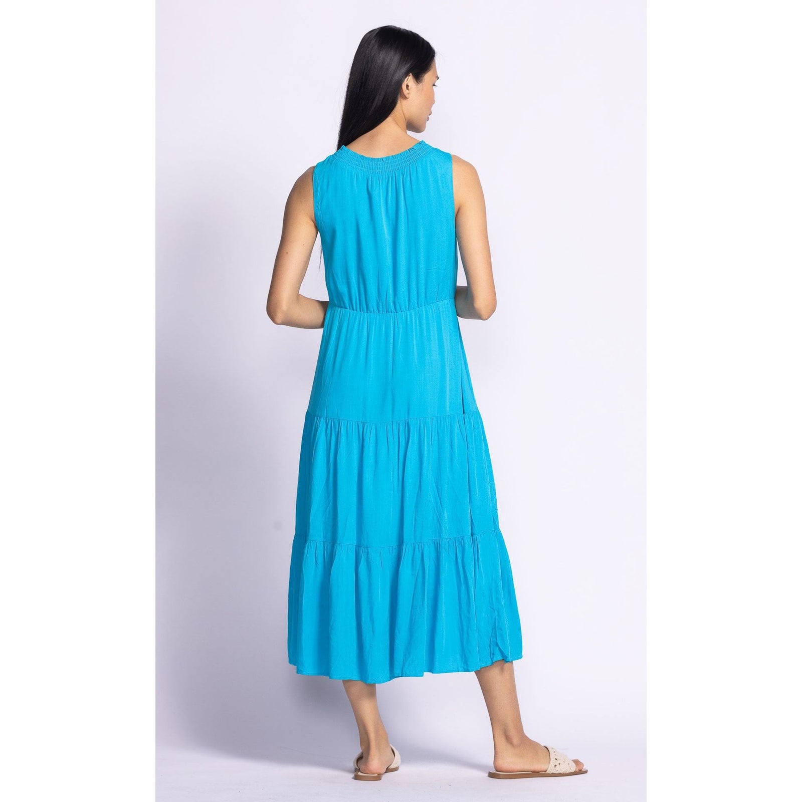 Elegant back view of the Pink Martini Jennifer Dress, showcasing its tiered design and flattering fit. Perfect for any occasion.