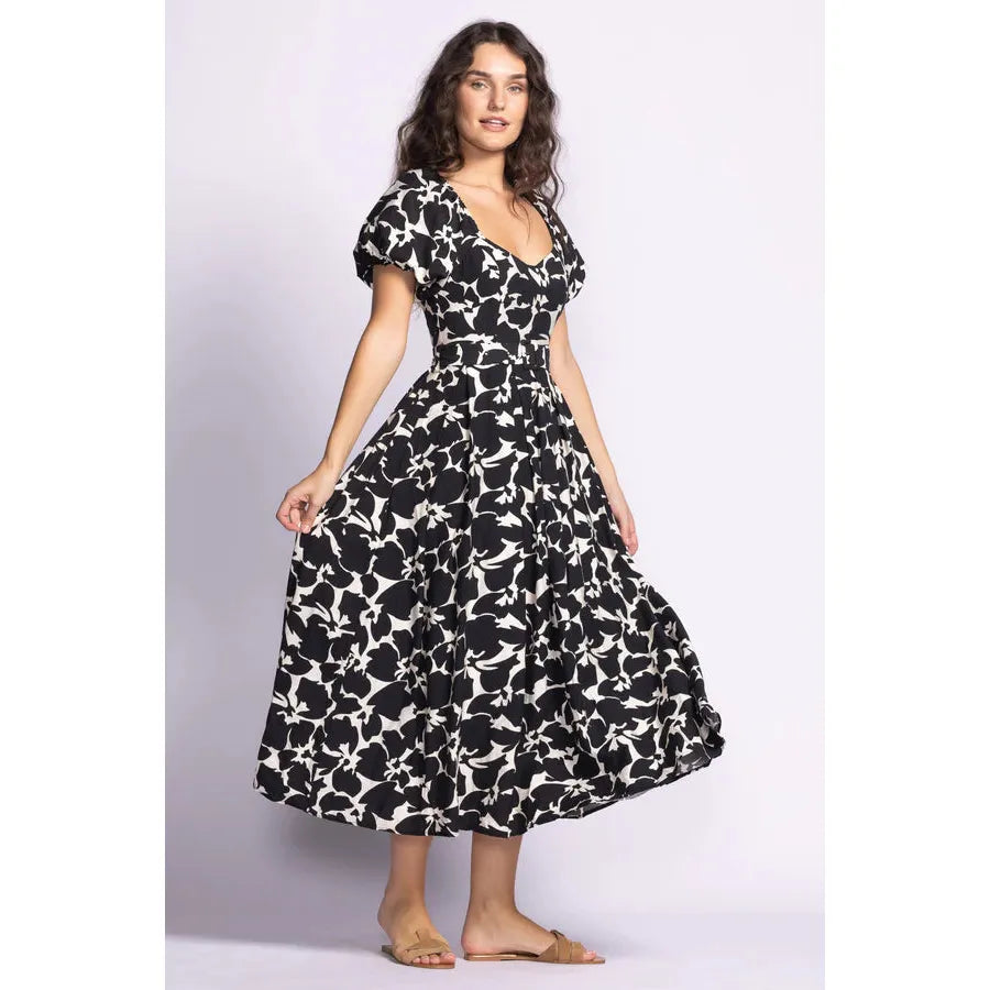 Elegant Pink Martini Rachel Dress featuring puffed sleeves and a flattering fit, perfect for garden parties.