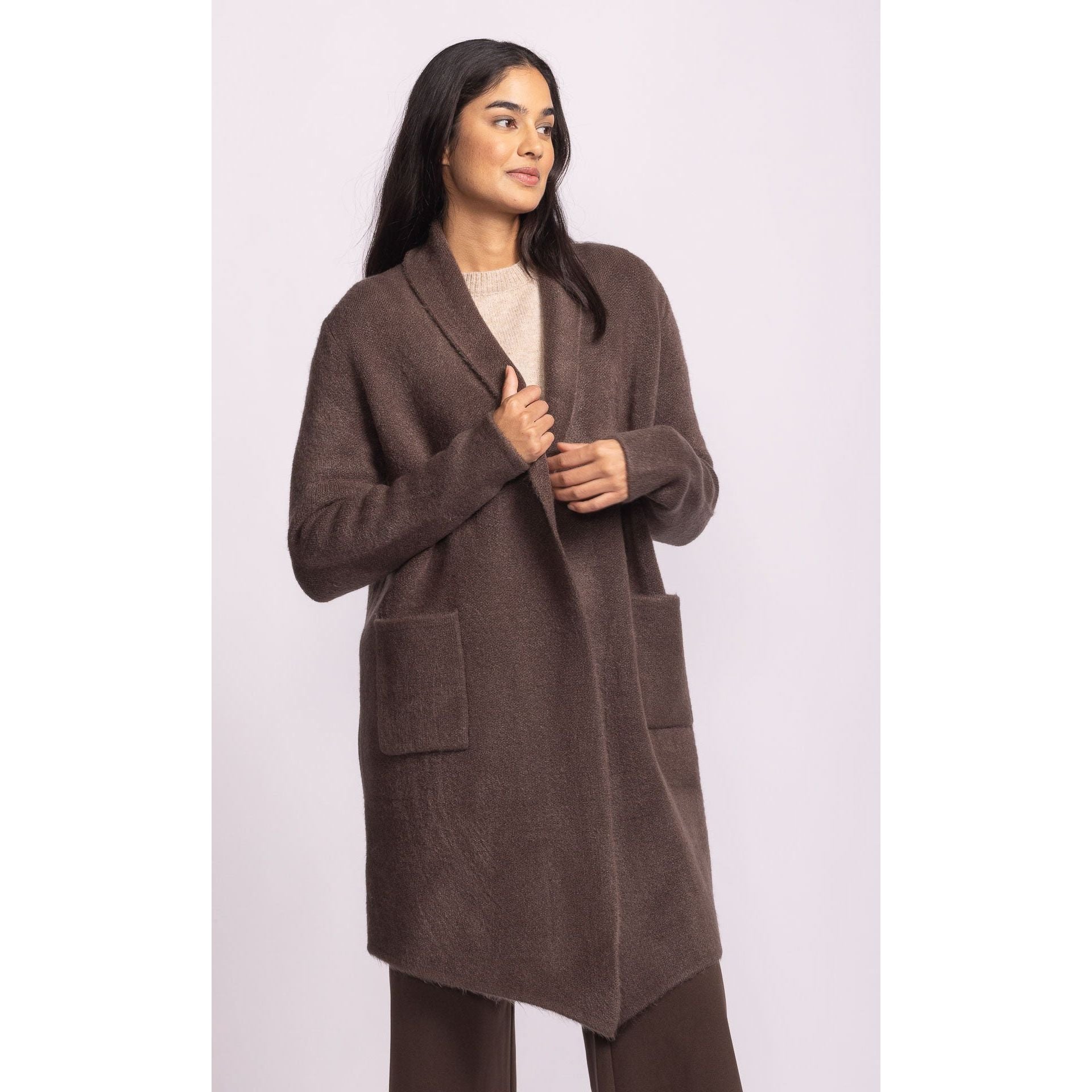 Pink Martini Stockport Jacket in brown, oversized mid-length coat with front pockets for versatile layering.
