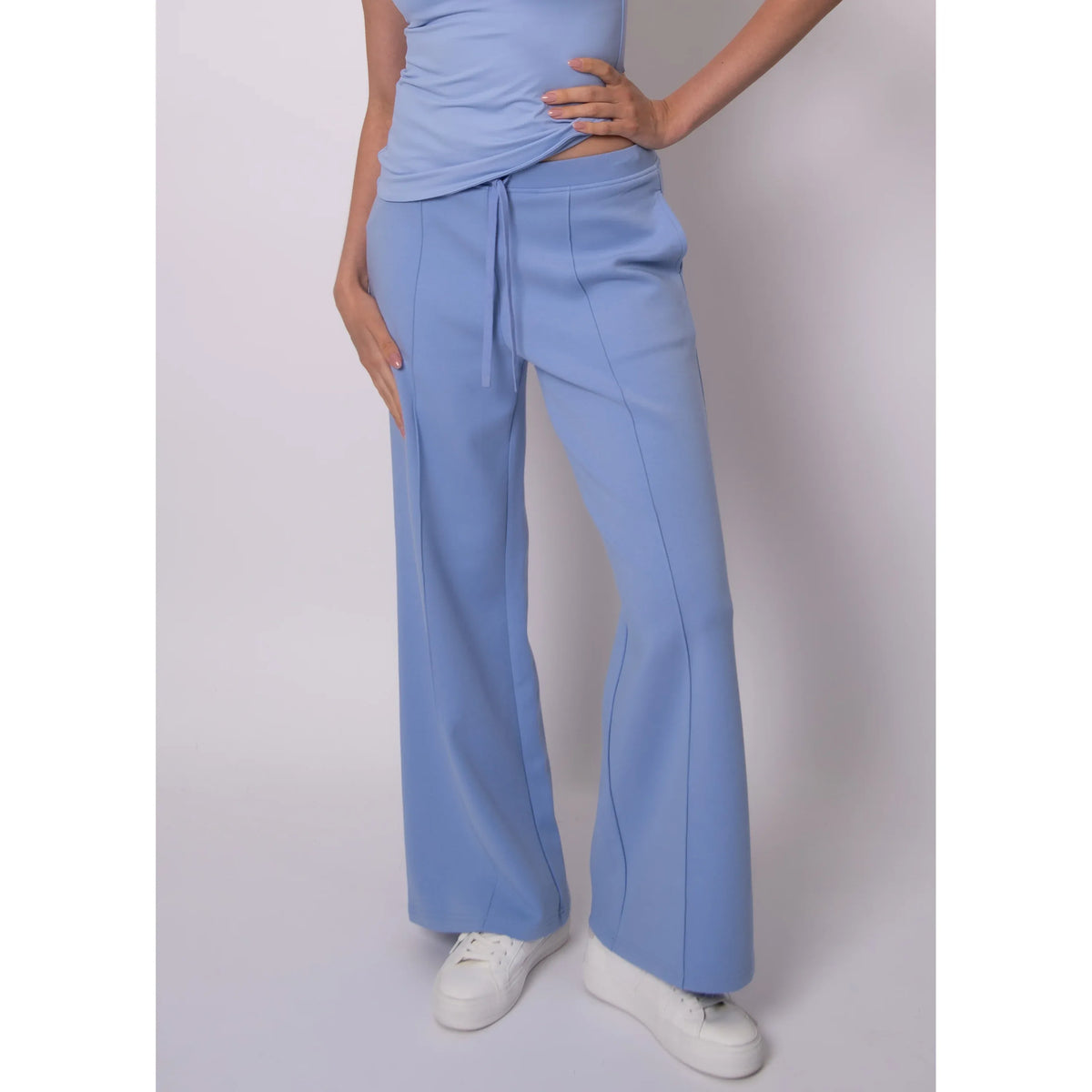Light blue Prida Soft Knit Pull-On Drawstring Pant with a wide-leg fit and adjustable waist.