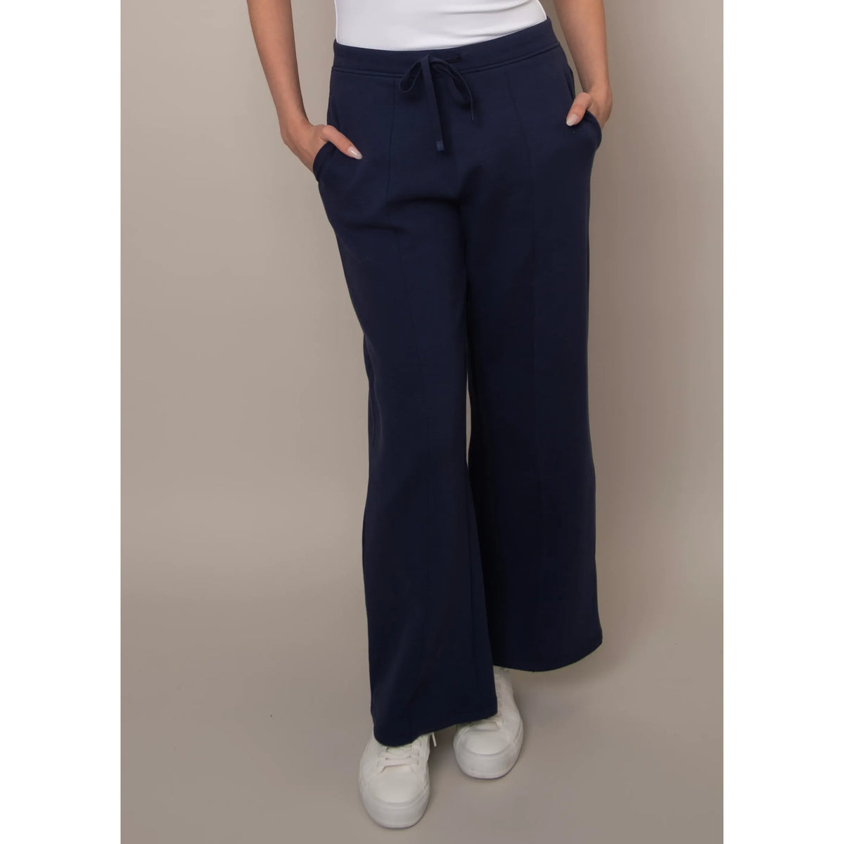 Prida navy soft-knit pull-on drawstring pant with side pockets, relaxed wide-leg fit.