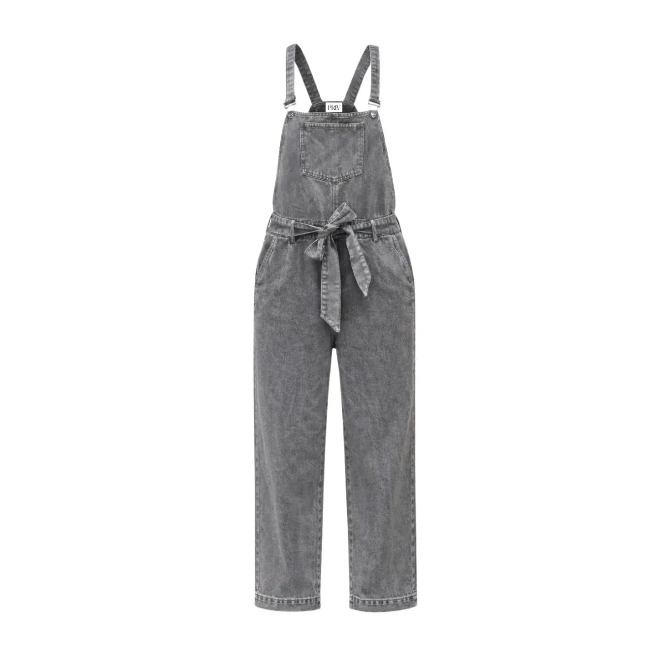 Priv Della Denim Overalls in faded grey, wide-leg silhouette with a bow belt, worn by a model in a white tee.