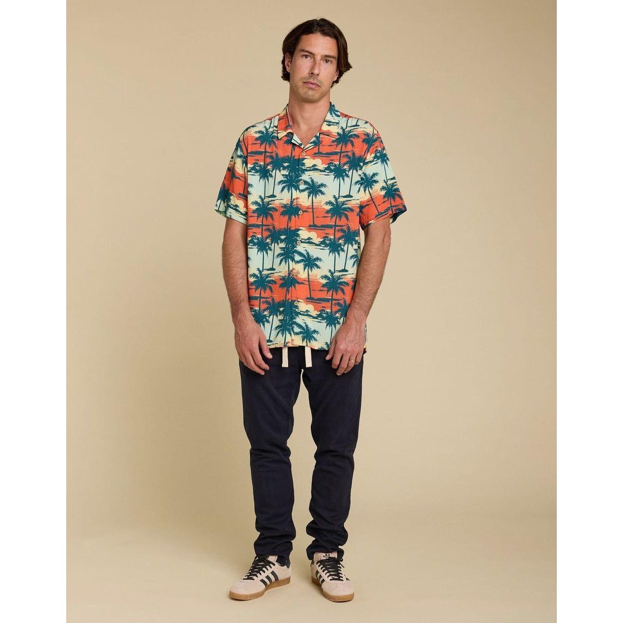 Stylish Pullin BayArbor Beach Shirt features vibrant Hawaiian design, short sleeves, and coconut button details.