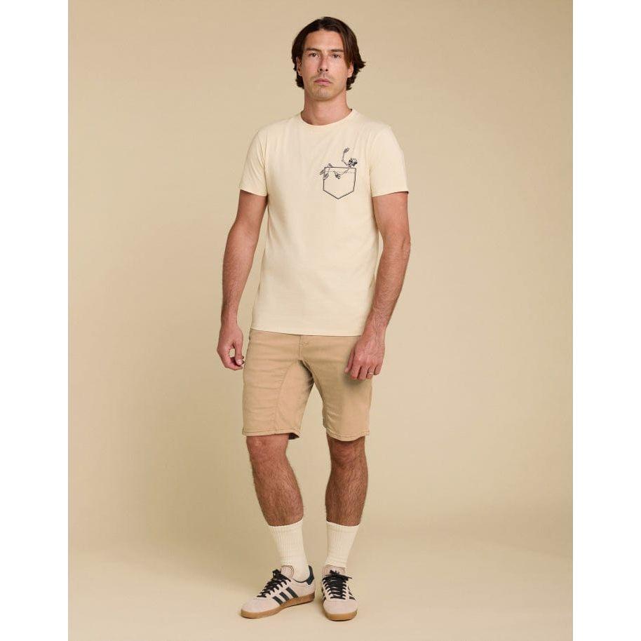 Beige Pullin Tchin Tee featuring a ribbed crew neck and short sleeves, styled for a casual look. Perfect for everyday wear.