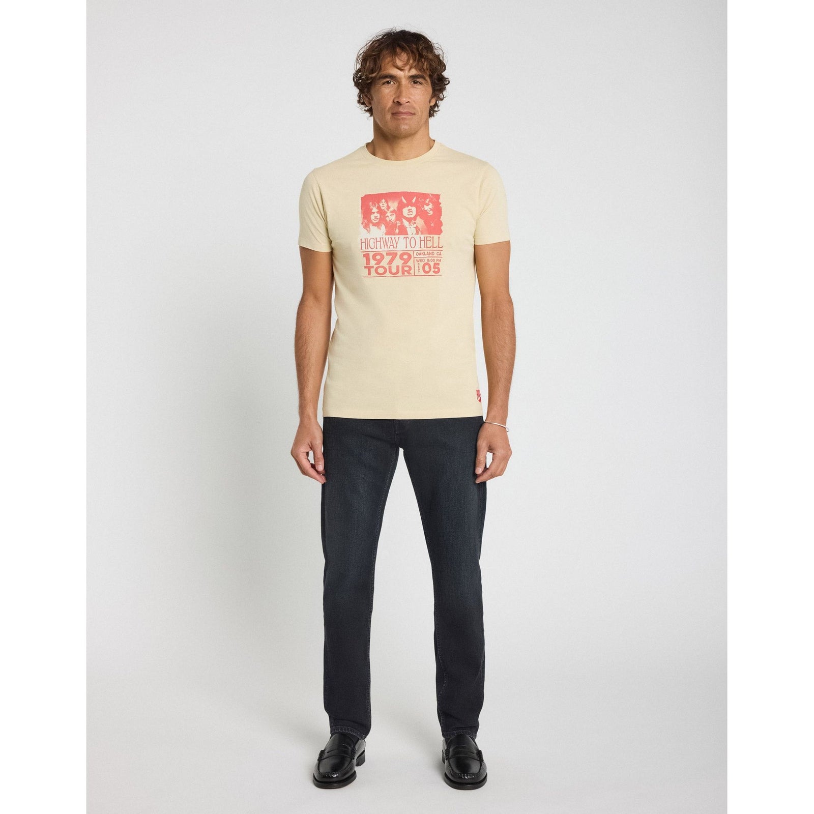 Sport the Pullin Volt Tee, inspired by AC/DC's iconic 1979 concert, perfect for rock rebels and fans alike.