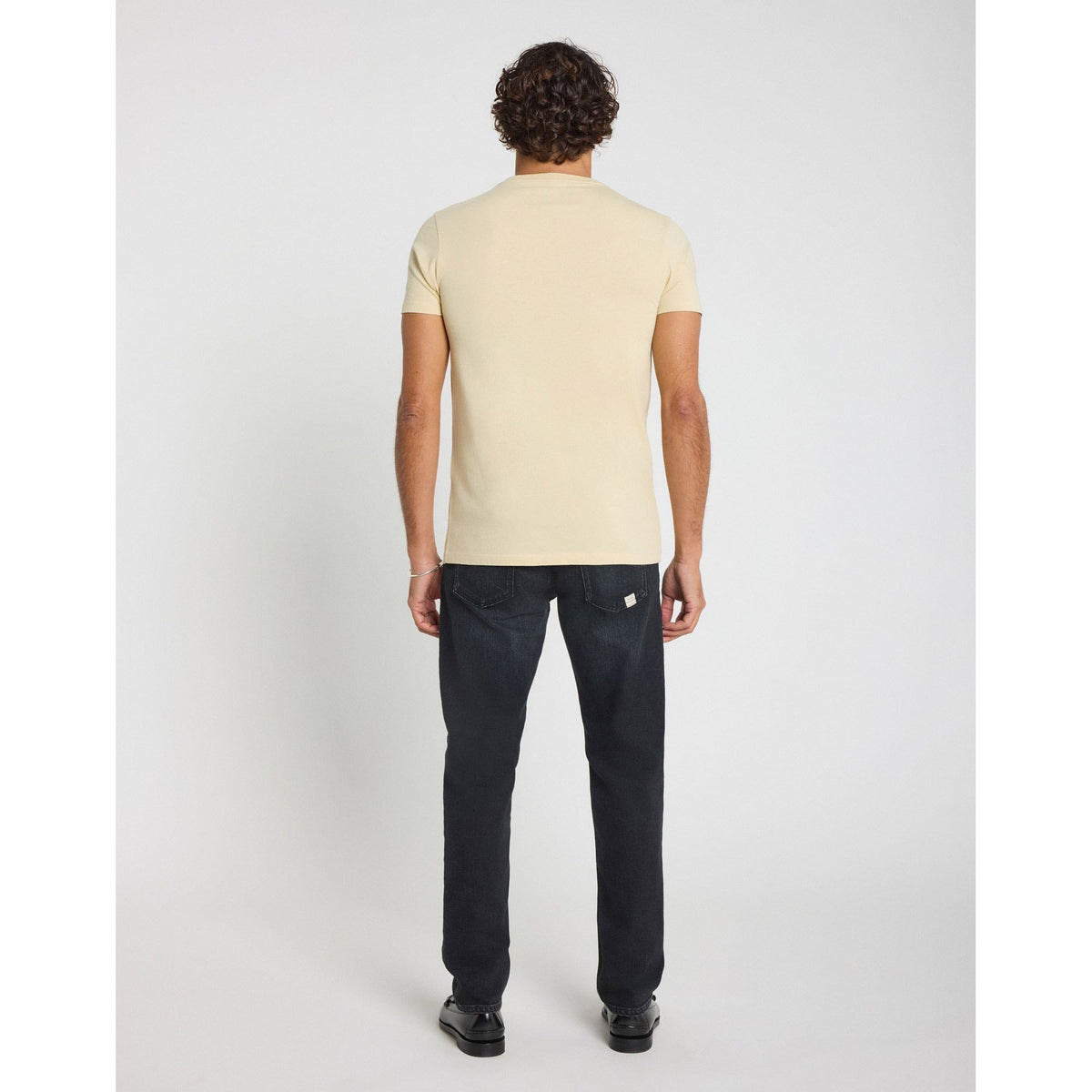 Stylish rear view of the Pullin Volt Tee, inspired by AC/DC's '79 concert, perfect for rock enthusiasts.