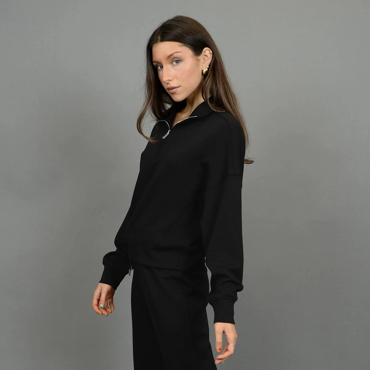 Stylish Mailyn Soft Scuba 1/2 Zip Pull Over in black, perfect for comfort and fashion. Pair with matching pants!