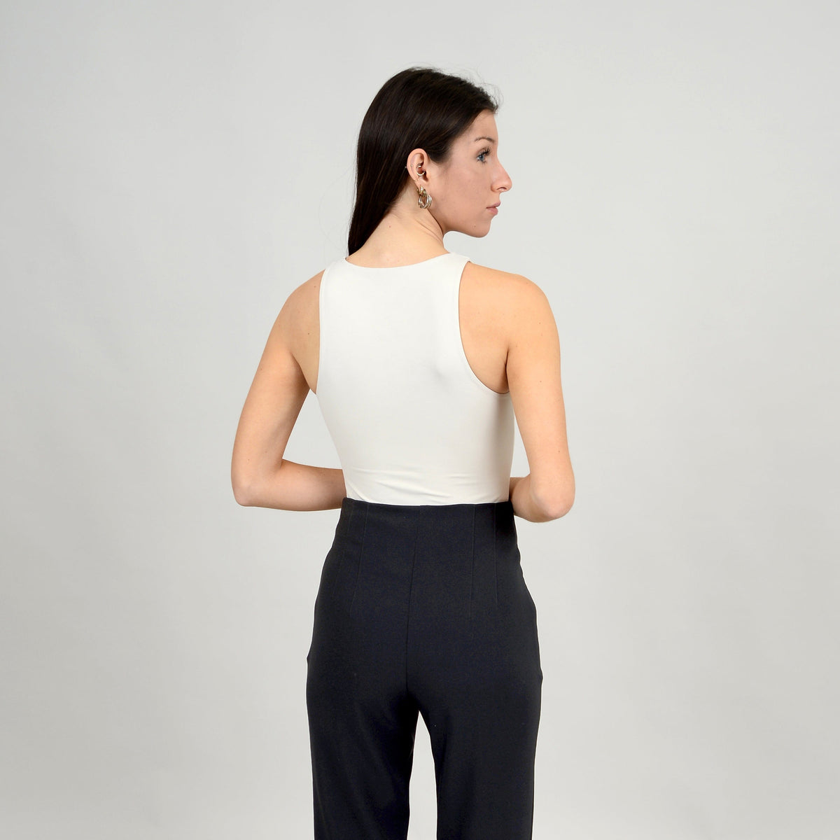 Second Skin Roxanna Crewneck Body Suit - Sale by RD Style, back view of model in white sleeveless bodysuit.