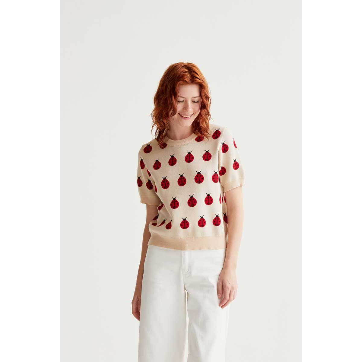 Red Coccinelle Print Tee with whimsical ladybug motif, short puff sleeves, round neck, rib-trimmed knit.
