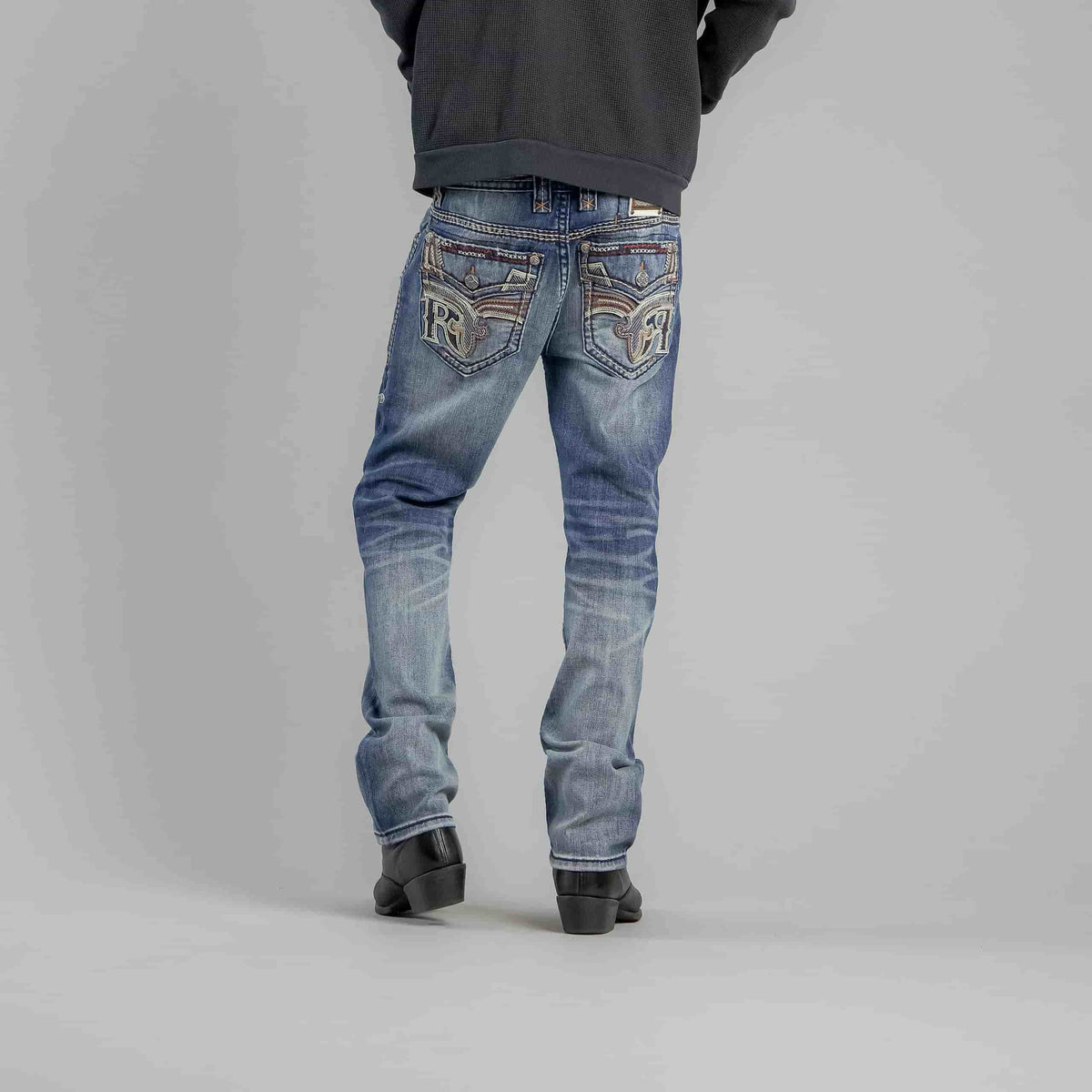 Rock Revival Bexton J202 straight denim jeans with Fleur-de-Lis embroidery on back pockets, vintage blue wash.