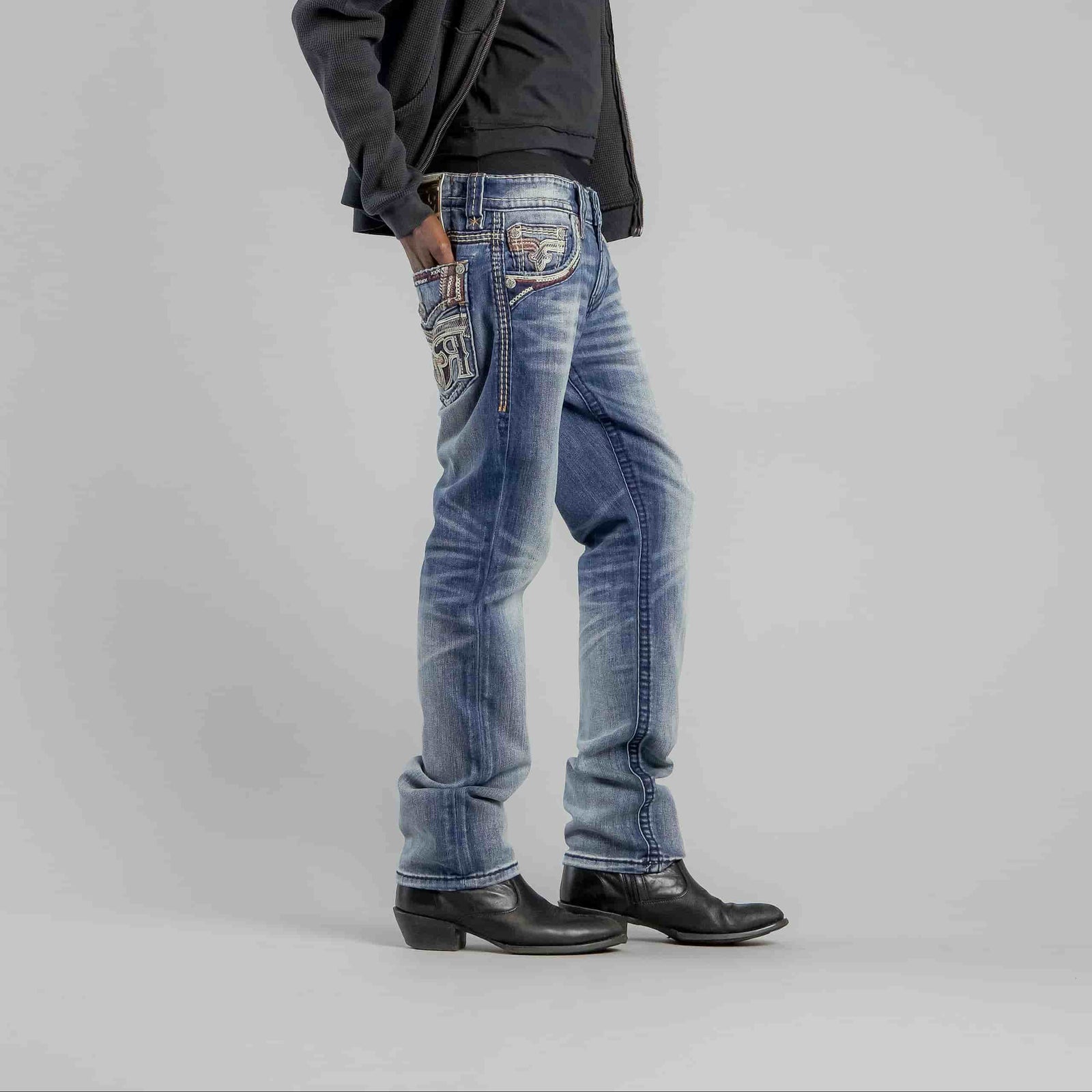 Rock Revival Bexton J202 straight denim jeans with hand-sanded vintage blue wash and fleur-de-lis embroidery.