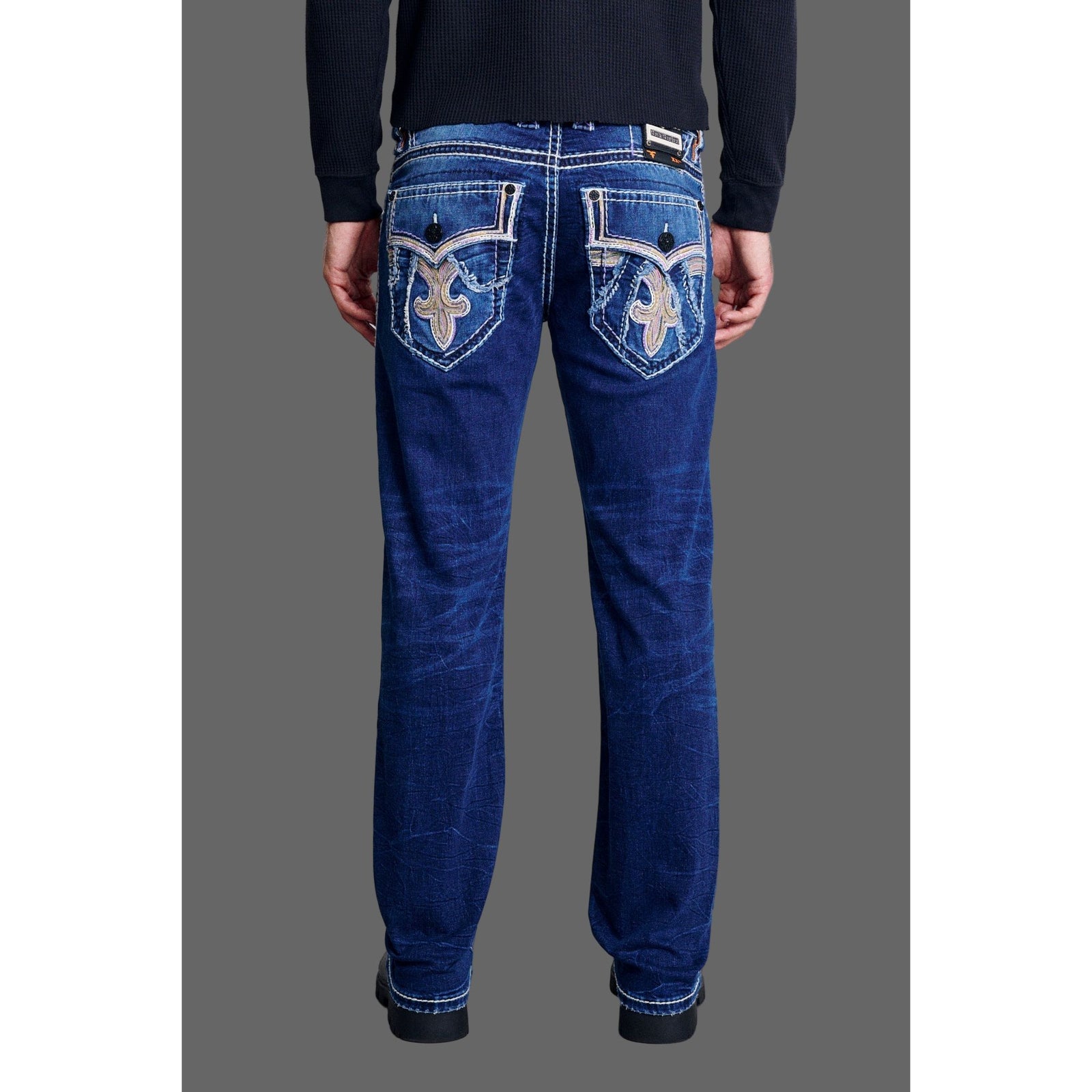 Rock Revival Cody J202 Straight Denim jeans, back view with embroidered fleur-de-lis pockets in dark wash.