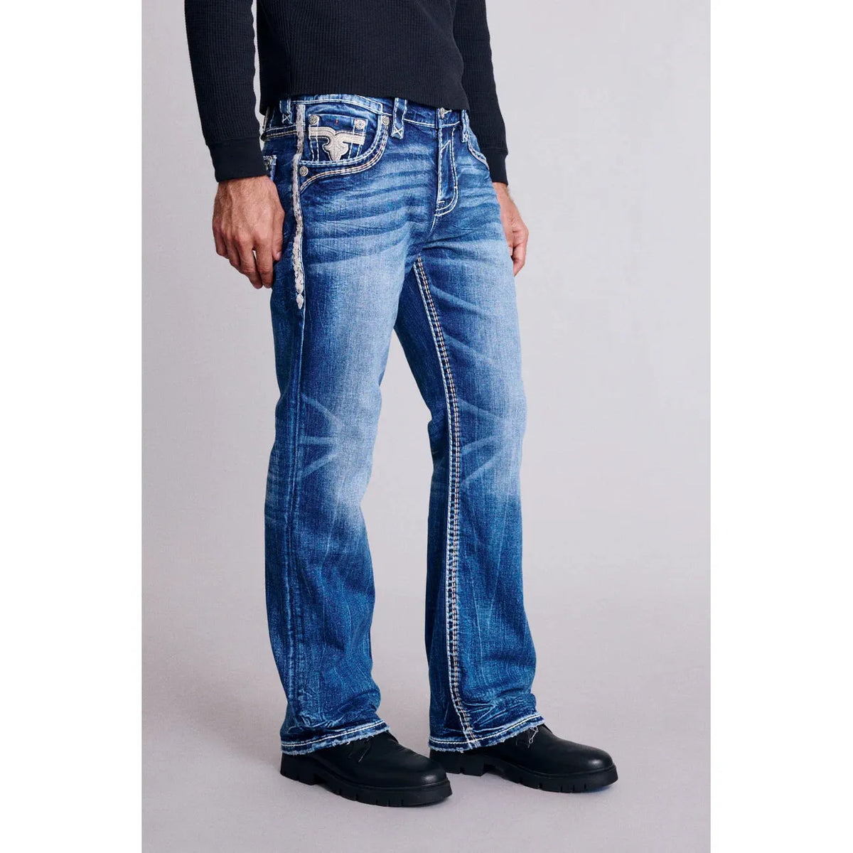 Shop the stylish Rock Revival Finnley B200 Bootcut jeans, perfect for comfort and a flattering fit in medium indigo.
