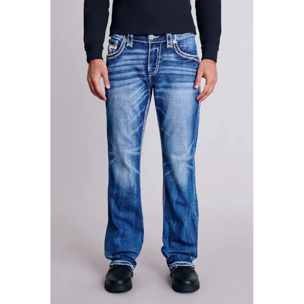 Stylish medium indigo Rock Revival Finnley B200 Bootcut jeans, crafted for comfort and a flattering fit.