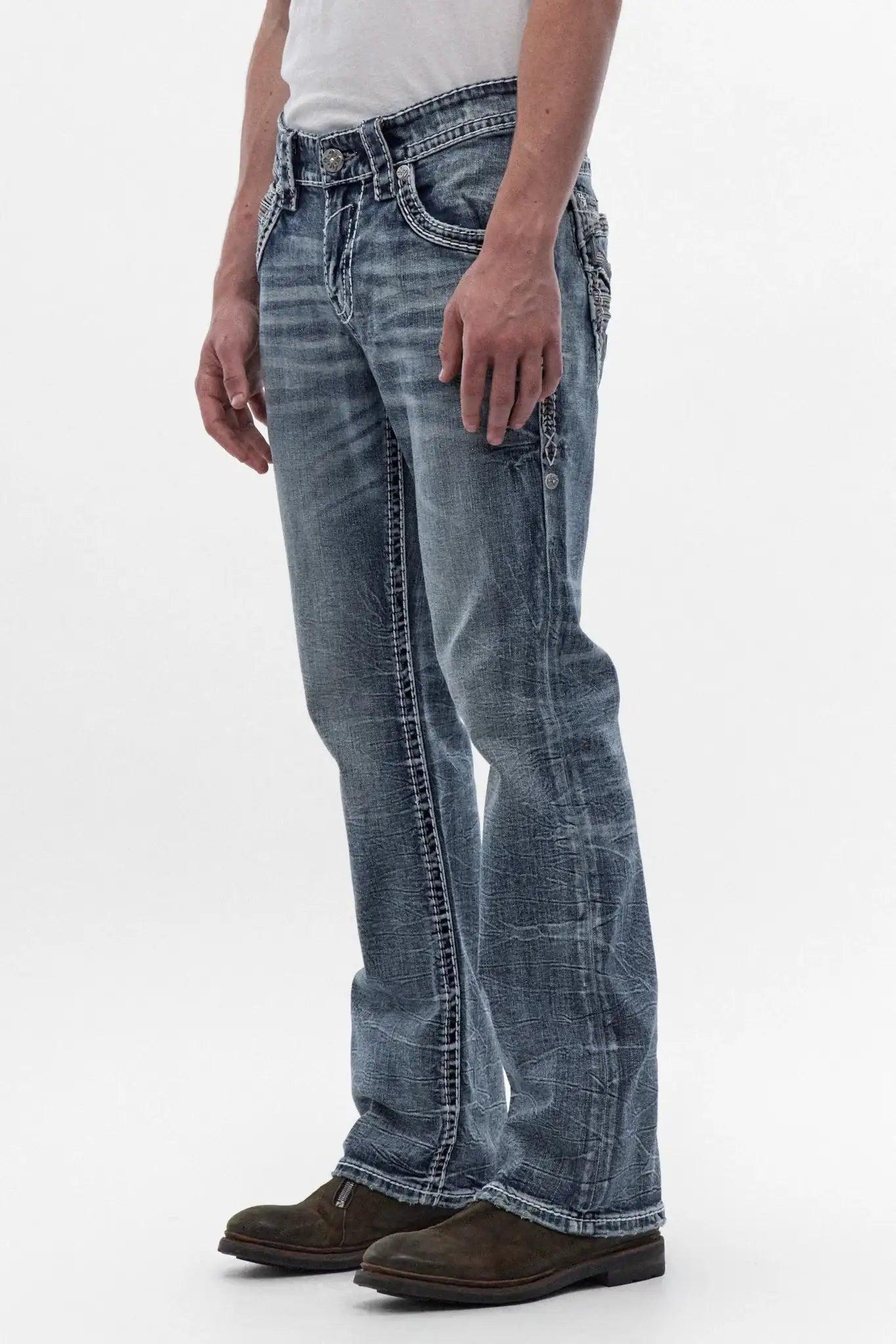Men's Rock Revival George bootcut jeans in medium blue with whiskering, side seam detailing, and fleur-de-lis back pocket embroidery.