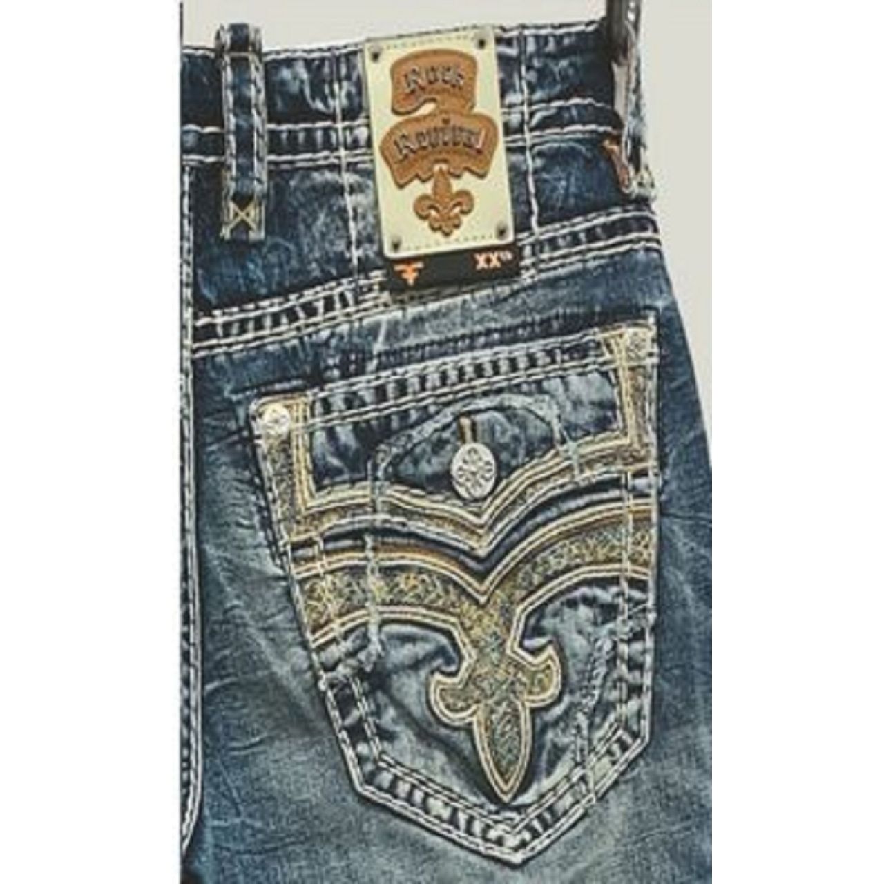 Rock Revival Justice B205 Bootcut jeans in medium indigo with ornate stitched back pocket and leather waistband patch.