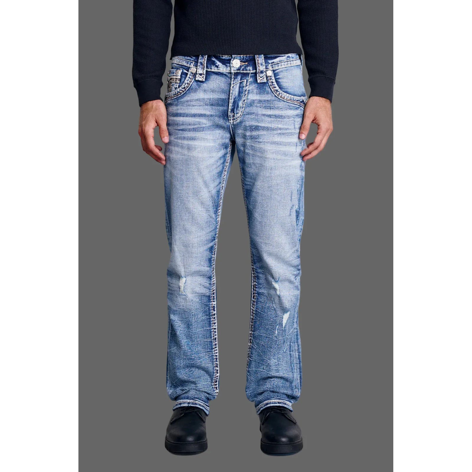 Rock Revival Mitchell J203 Straight Denim jeans in light blue stretch denim with whiskering on a model.
