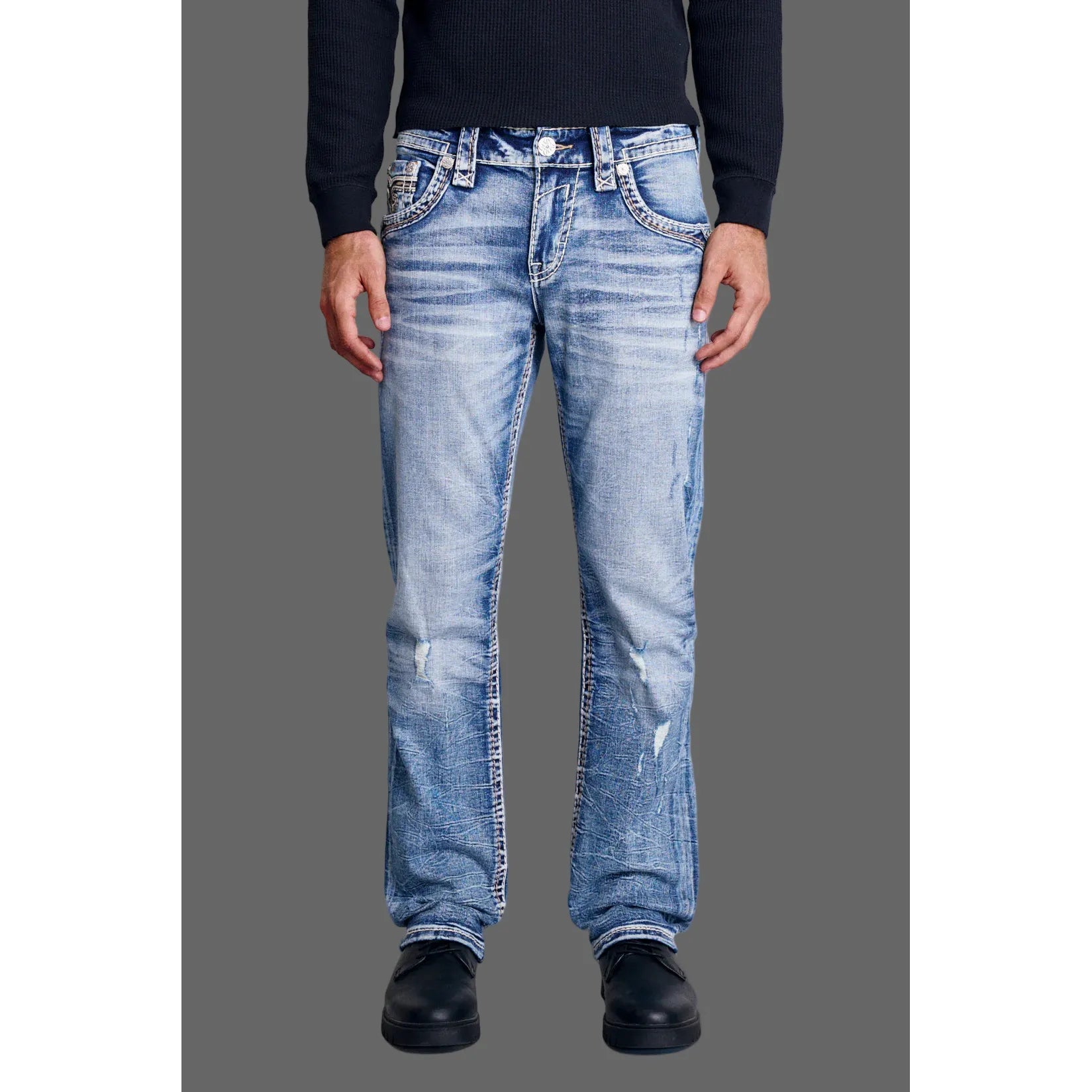 Rock Revival Mitchell J203 Straight Denim jeans in light blue stretch denim with whiskering on a model.