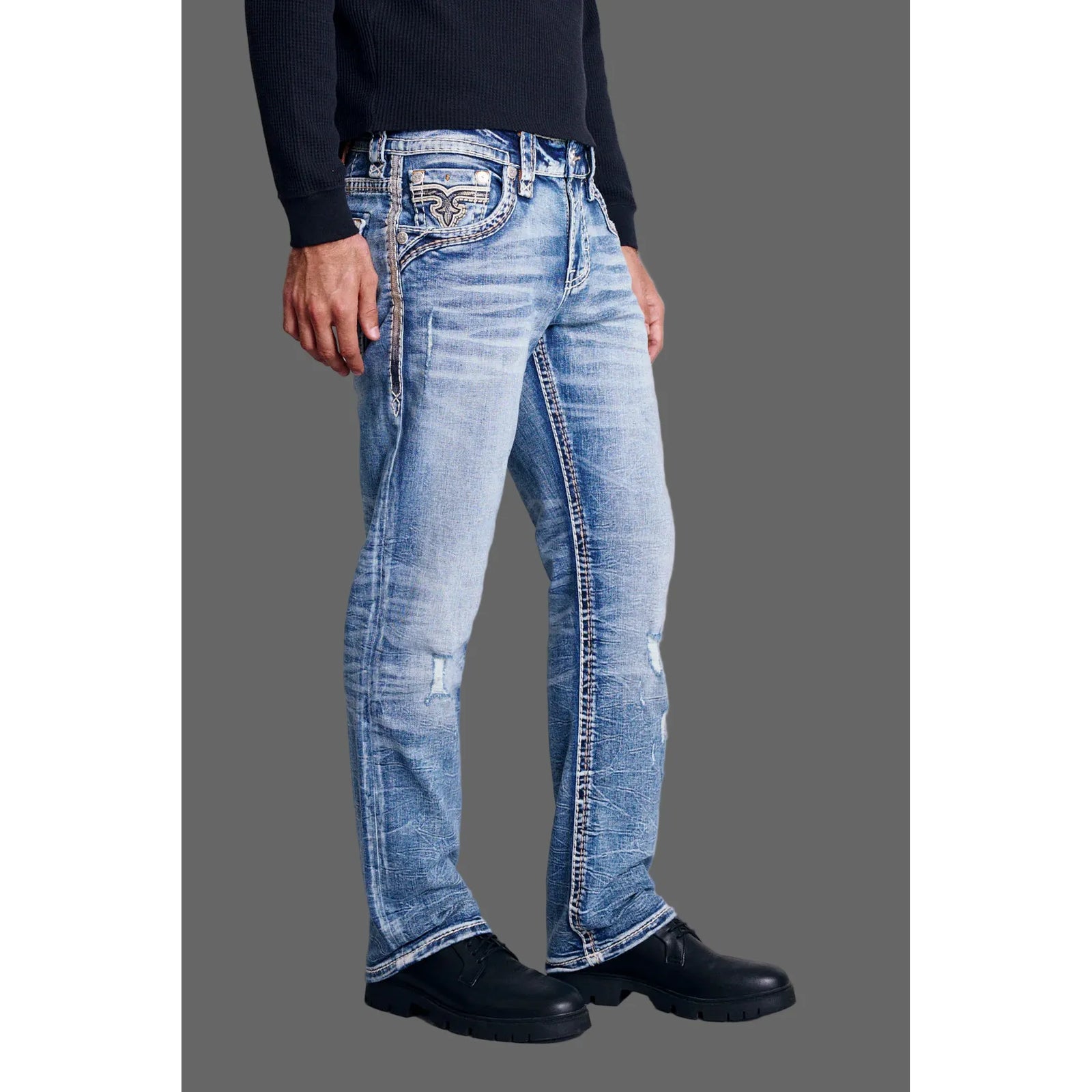 Rock Revival Mitchell J203 Straight Denim jeans in light blue stretch denim with whiskering on a model.