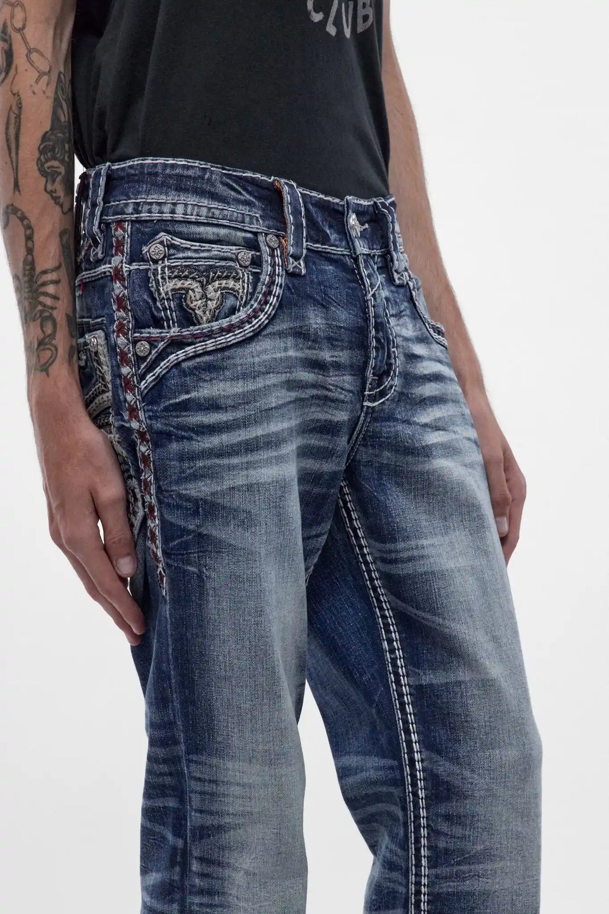 Rock Revival Ozzy B203 bootcut jeans in medium blue with signature back pocket embroidery and contrast side stitching.