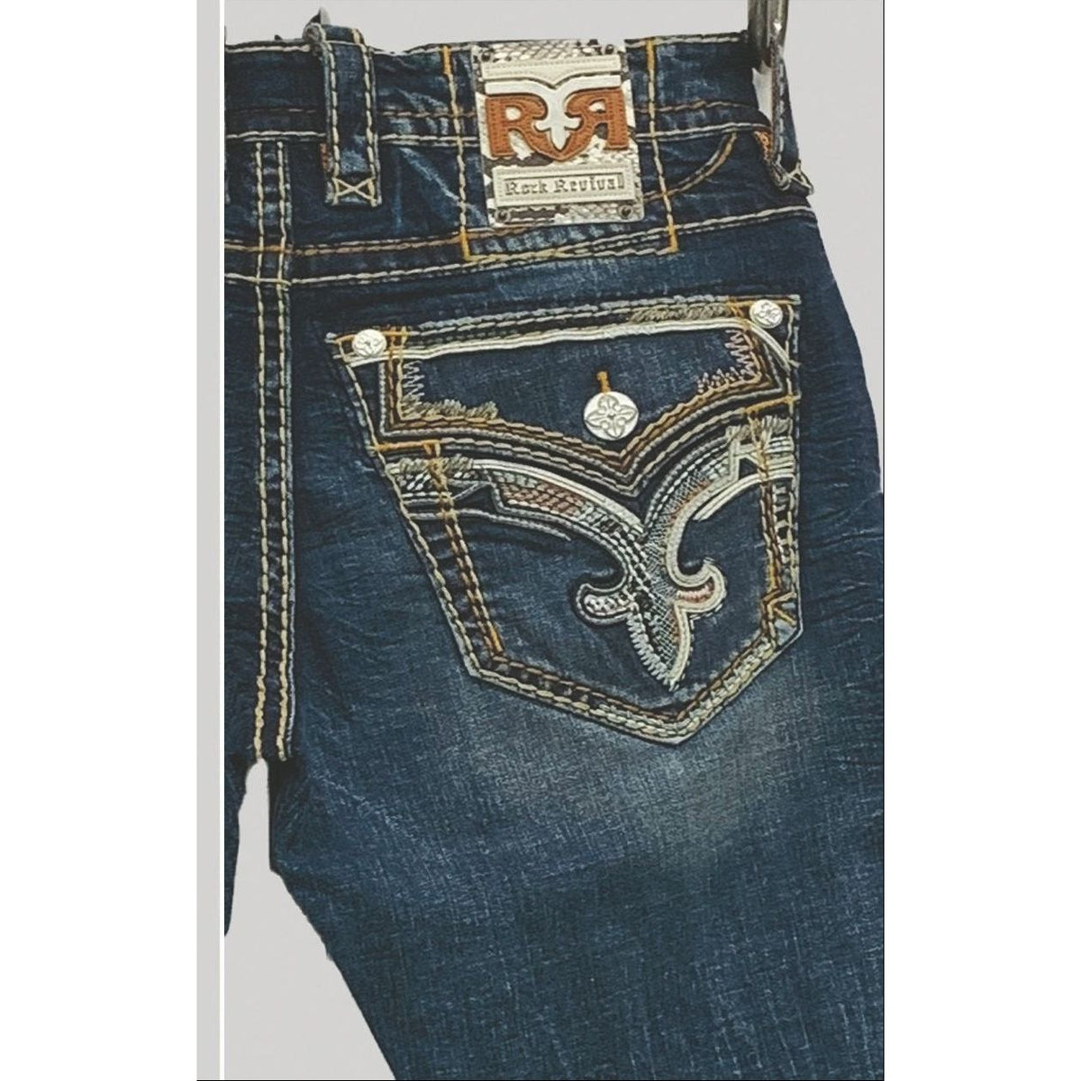 Rock Revival Theodore J201 Straight jeans with decorative back pocket fleur-de-lis embroidery and metal rivet accents.