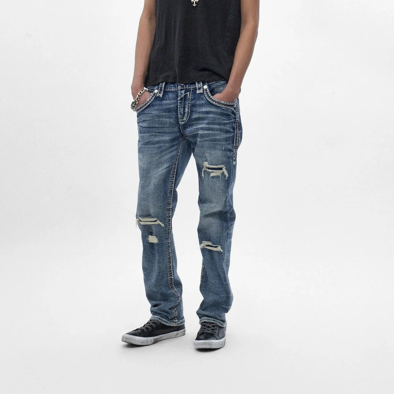 Rock Revival Zayn J200 straight jeans in indigo with knee rips, side chain detail, and signature back pocket embroidery.