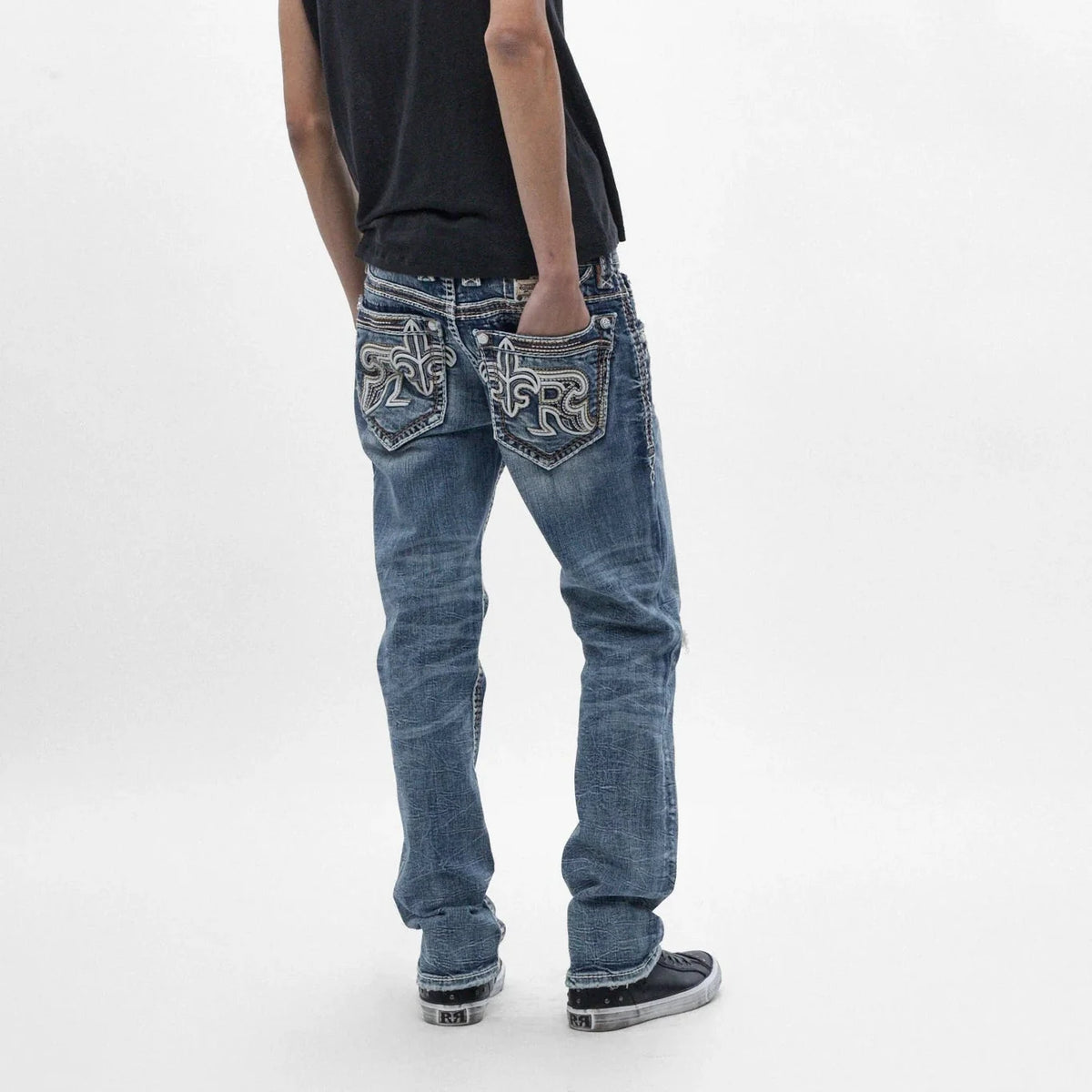 Back view of Rock Revival Zayn J200 straight jeans featuring indigo wash, subtle fading, and signature back pocket embroidery.