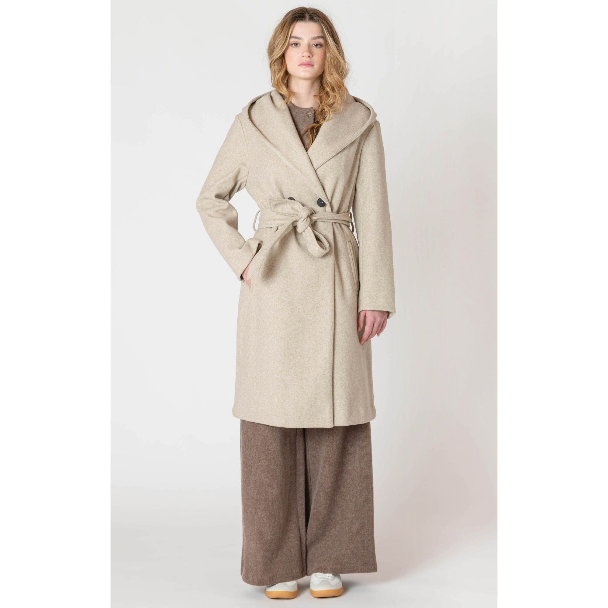 Room 34 Belted Hooded Coat in beige with belt and front button closure on model.