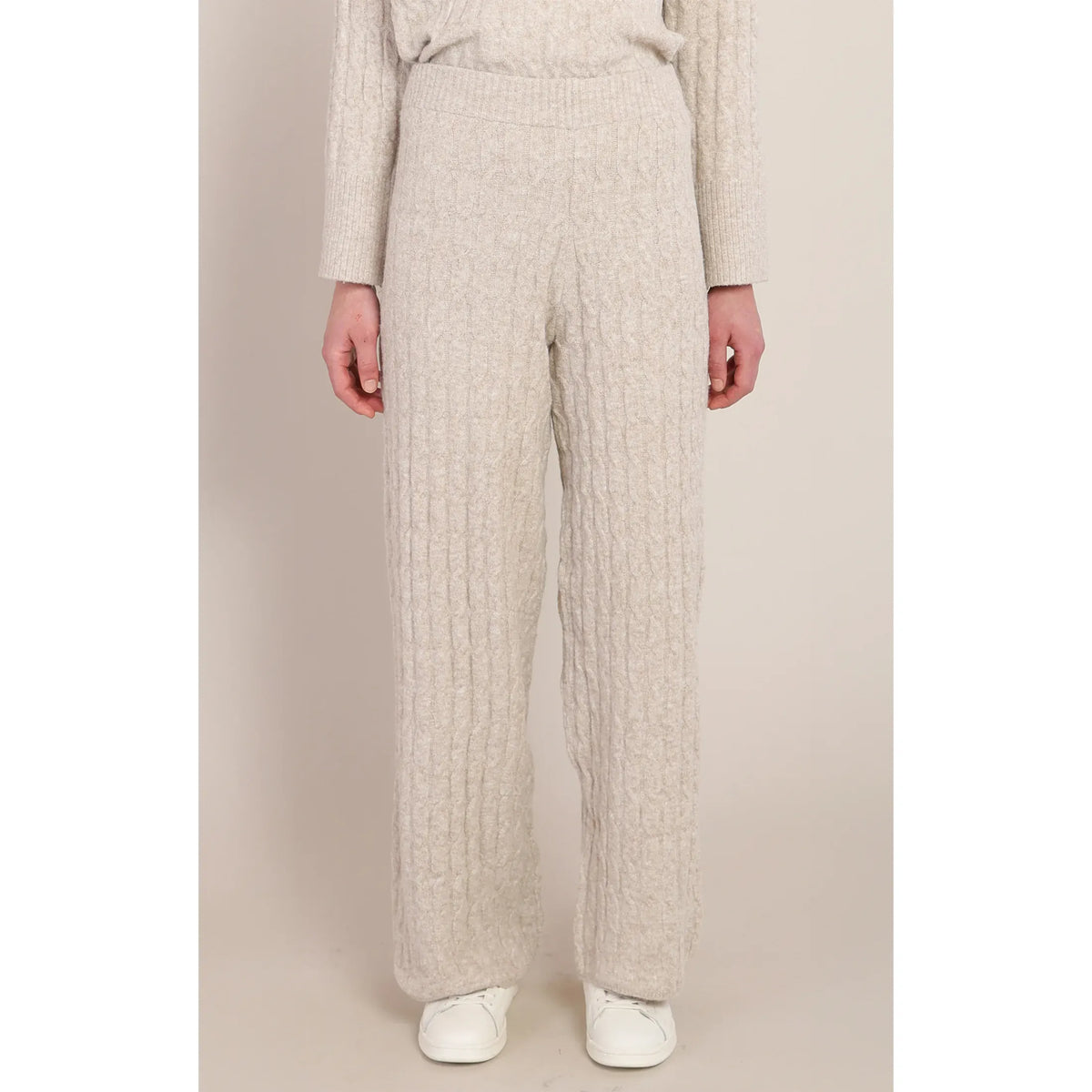 Room 34 Cable Knit Pant in warm beige with cable knit pattern and pull-on waist, shown with a matching knit top.